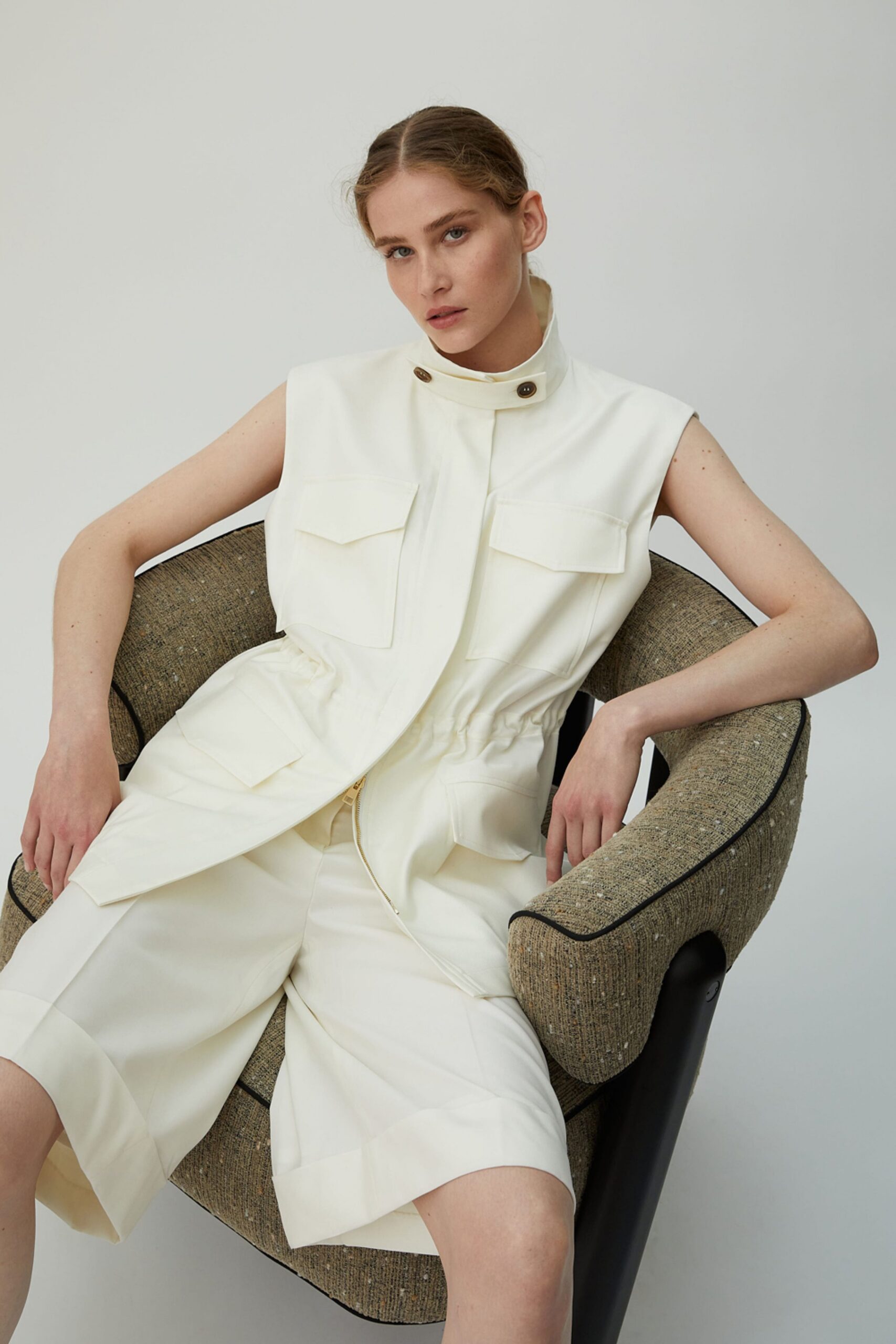 white fitted sleeveless jumpsuit