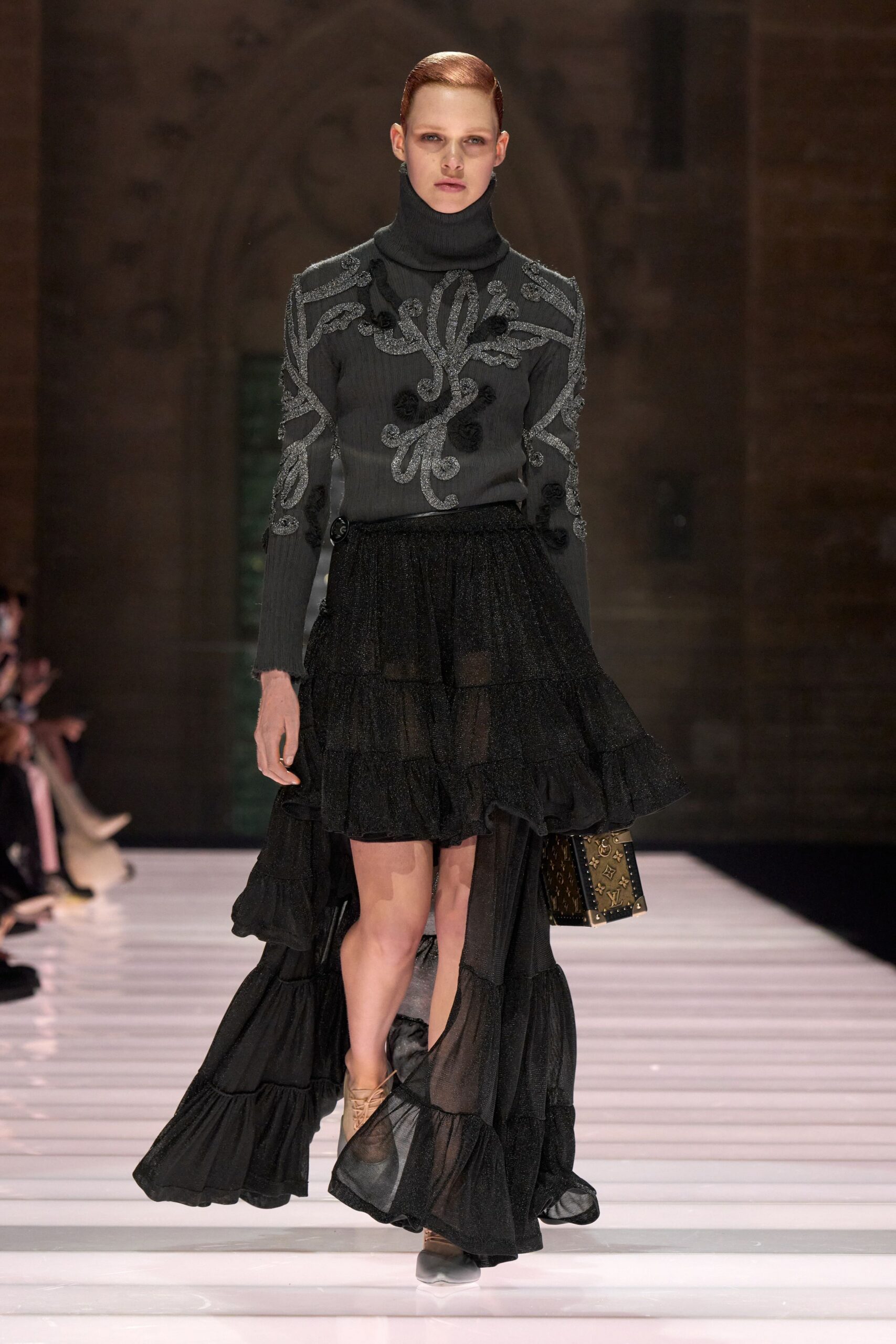 black embroidered top and tiered skirt