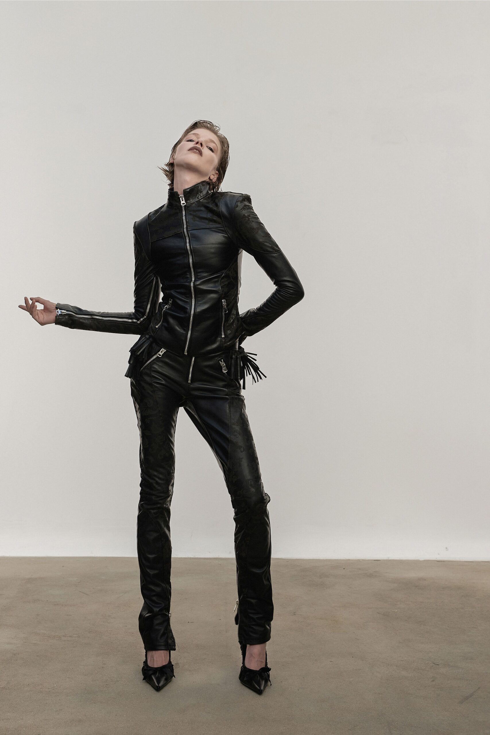 black leather fitted jacket and pants