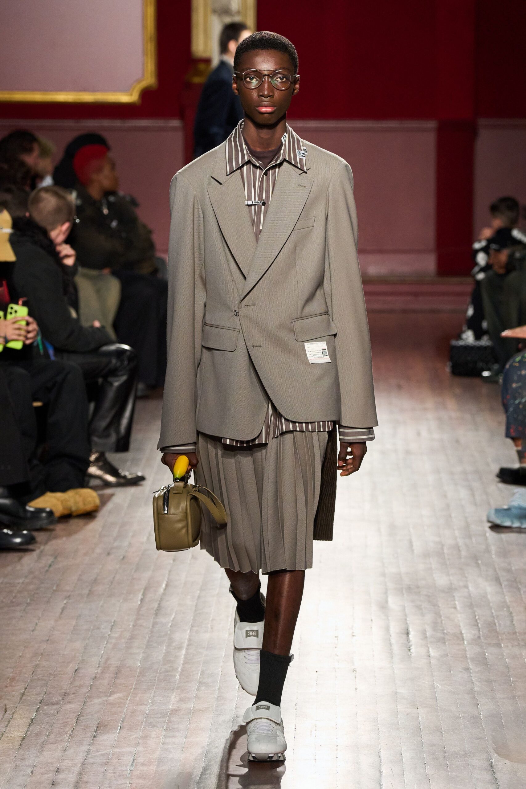 gray tailored blazer with pleated skirt