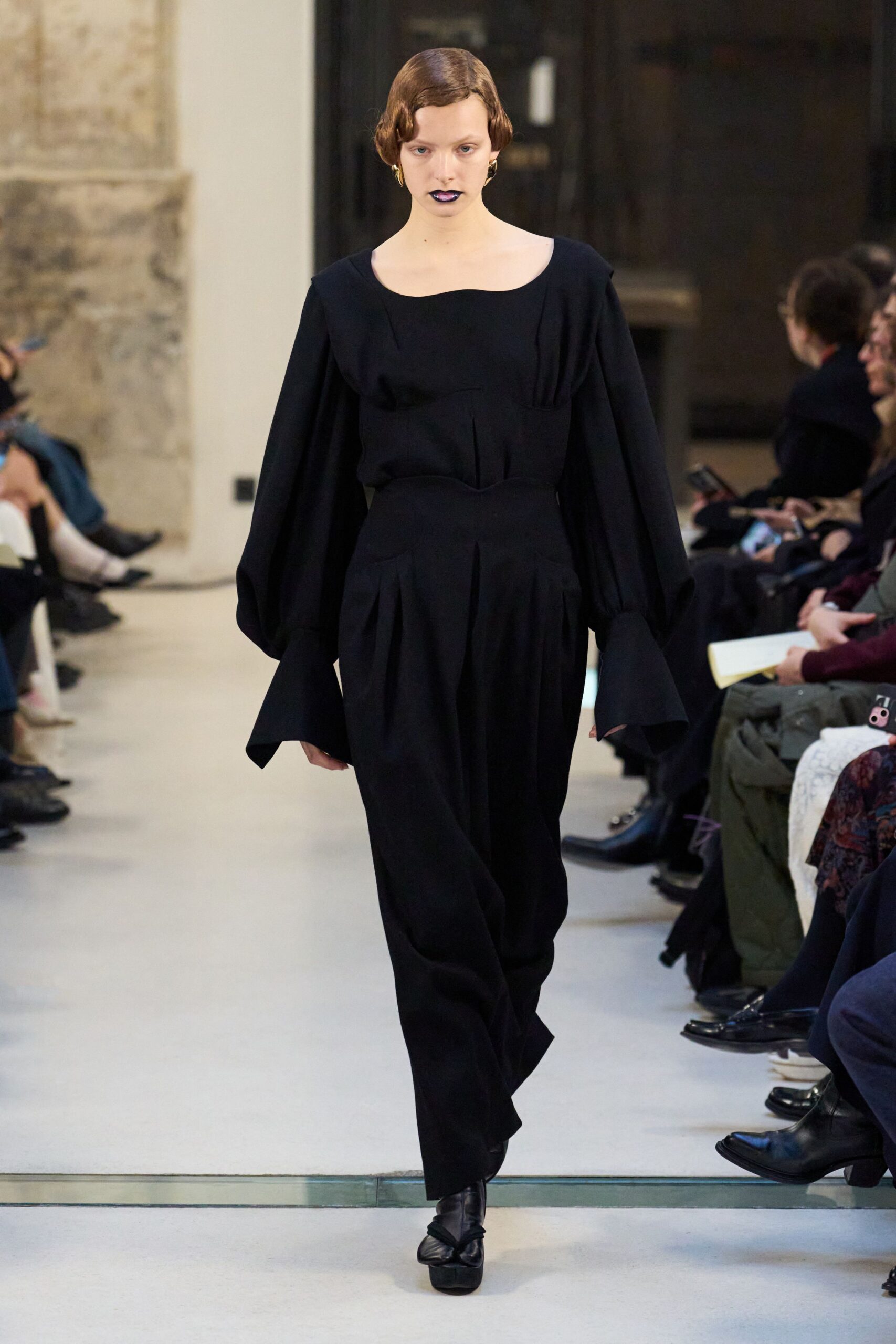 black fitted maxi dress with long sleeves