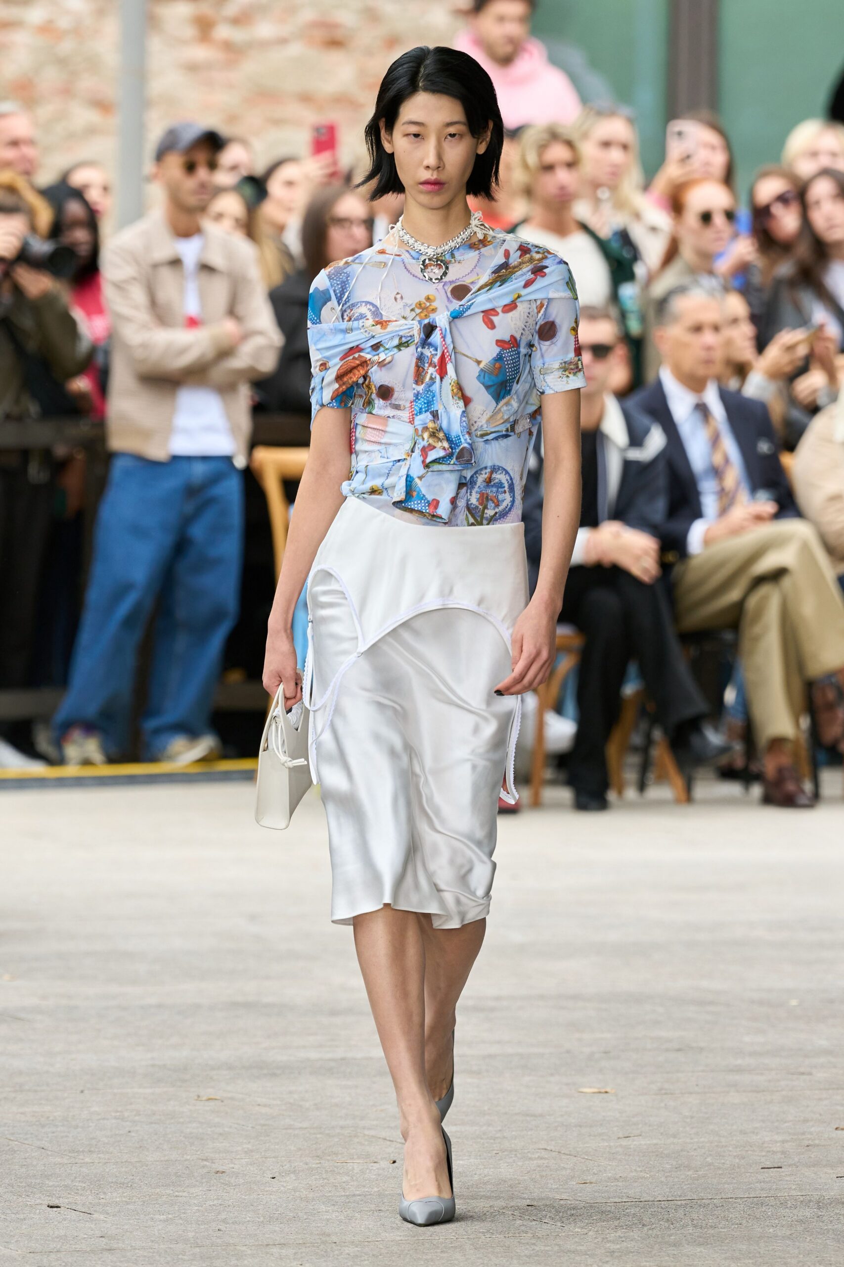 blue printed silk top with white midi skirt