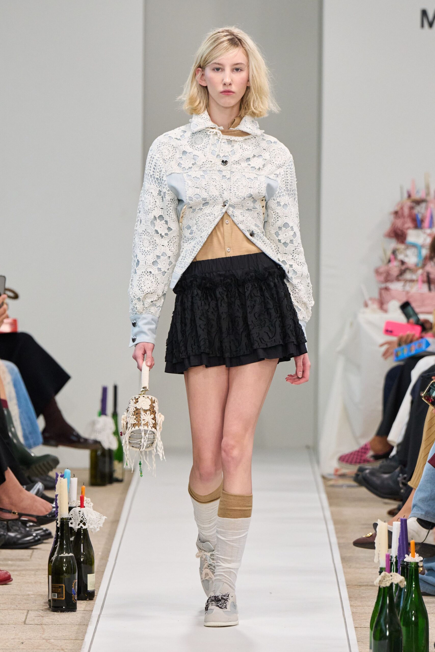 blue embroidered shirt with black skirt