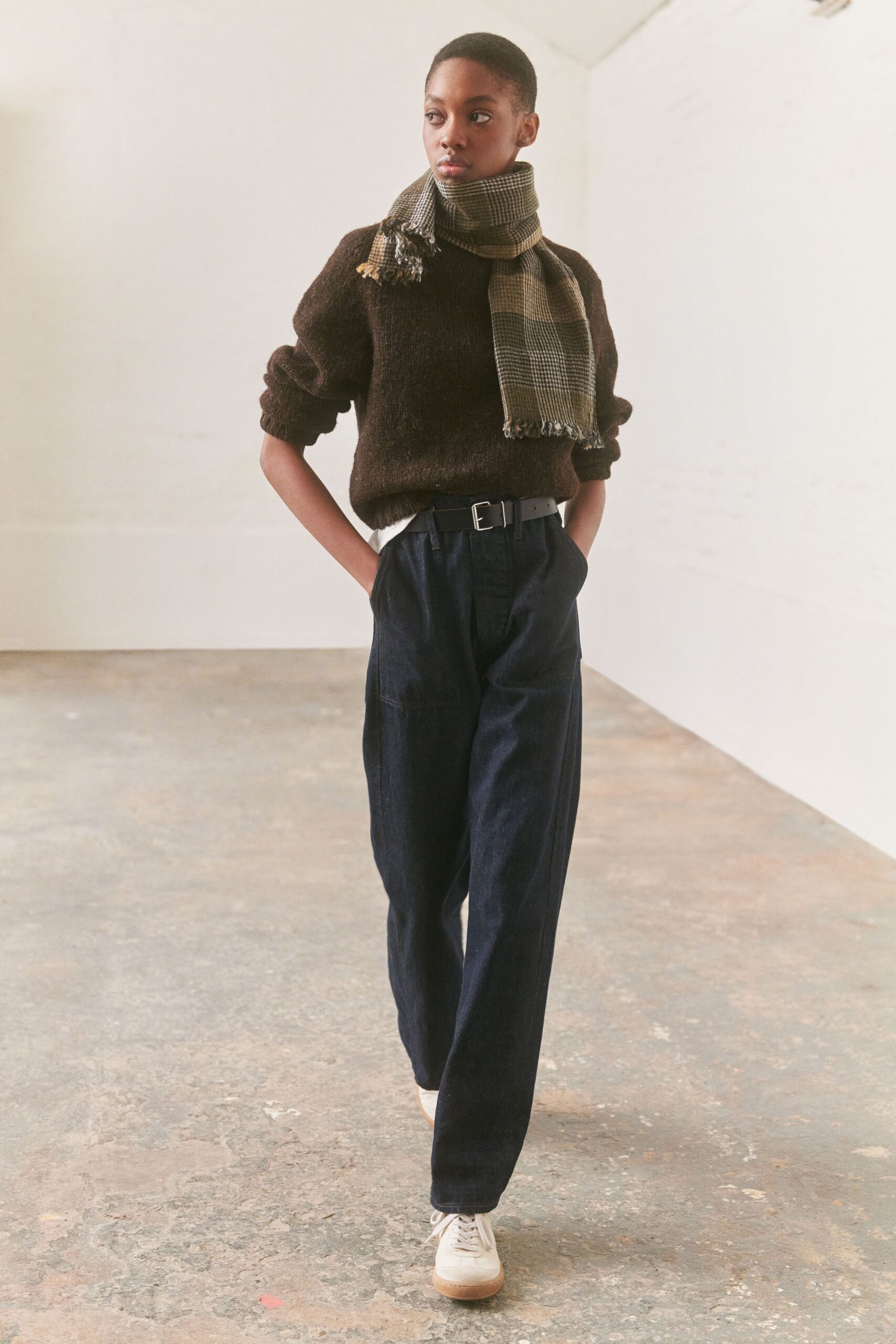 brown wool sweater with blue pants