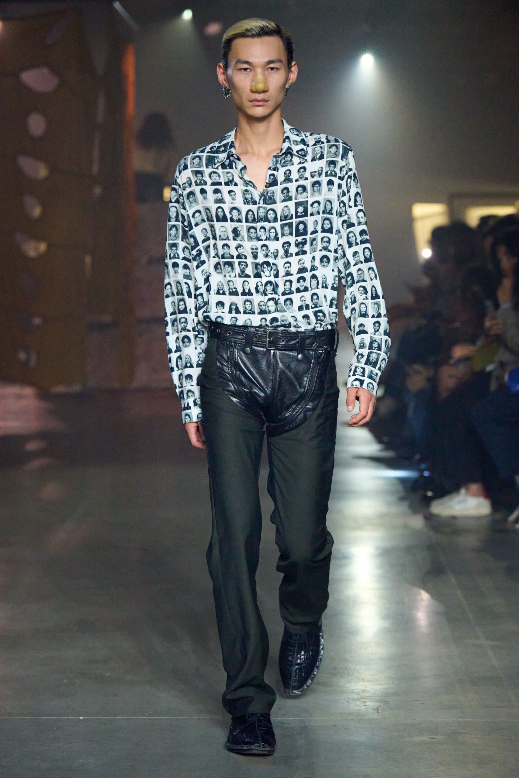 black leather pants with printed shirt