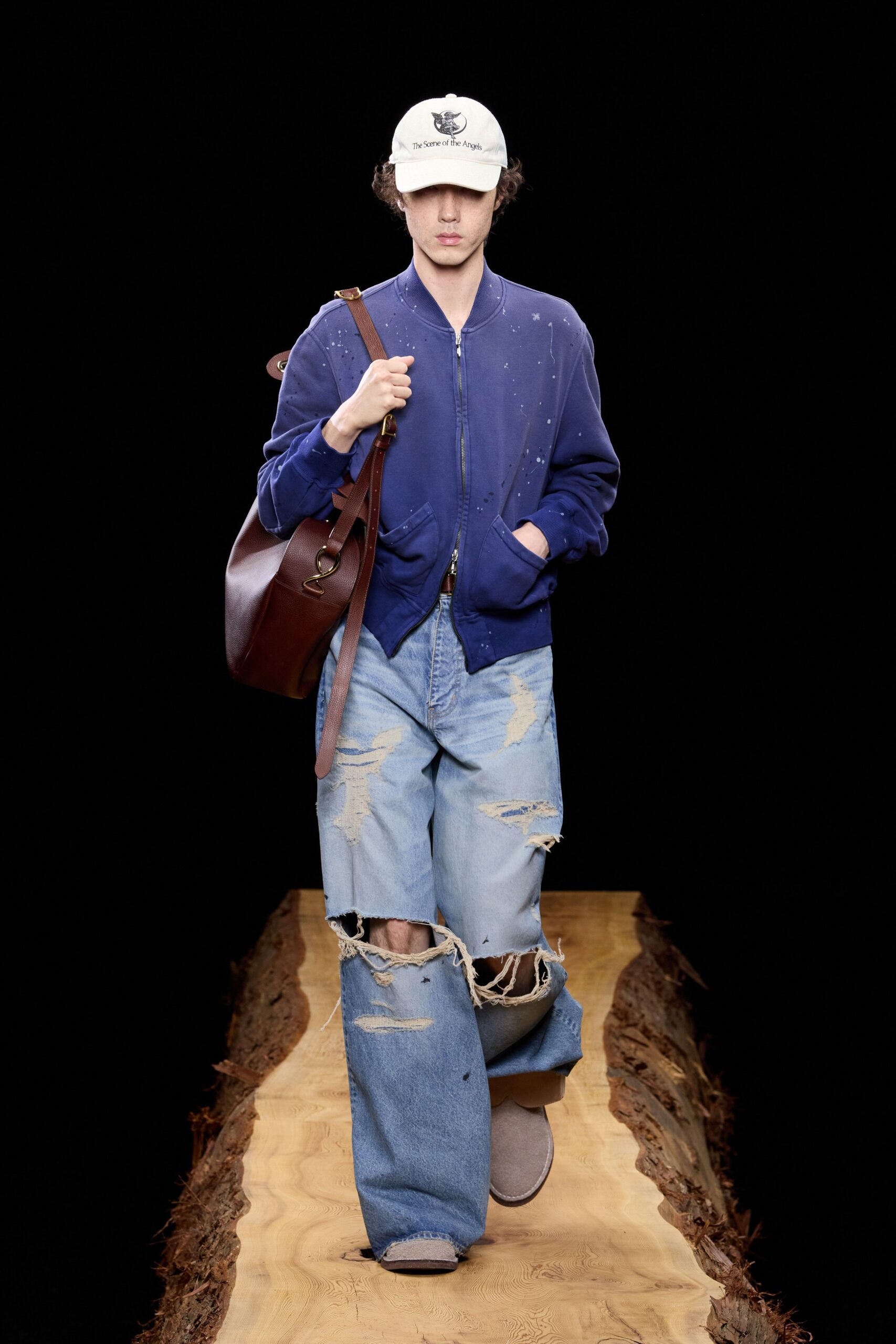 blue relaxed jacket with distressed pants