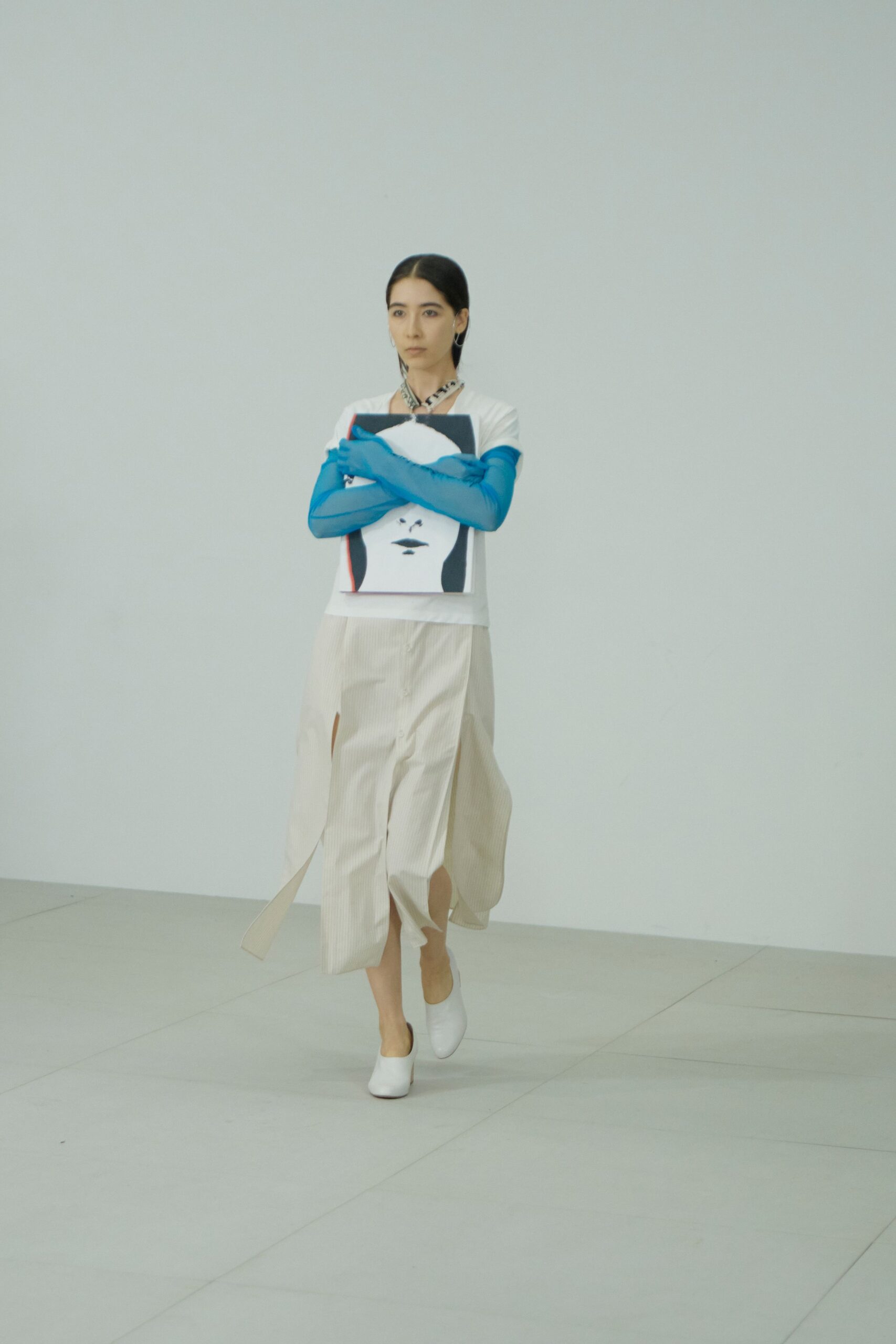 white blue color-blocked top with beige midi skirt