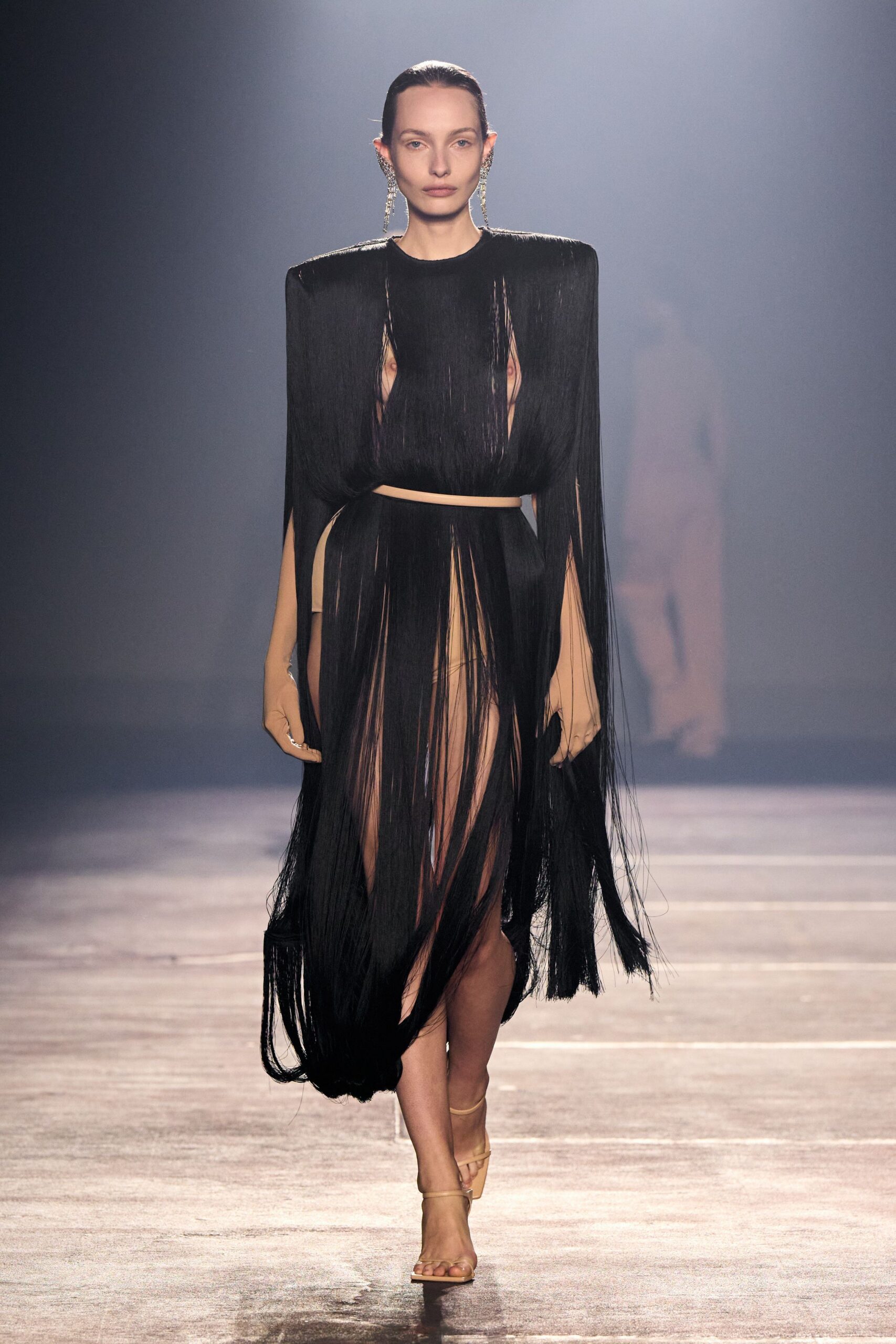 black fringed maxi dress with beige shoes
