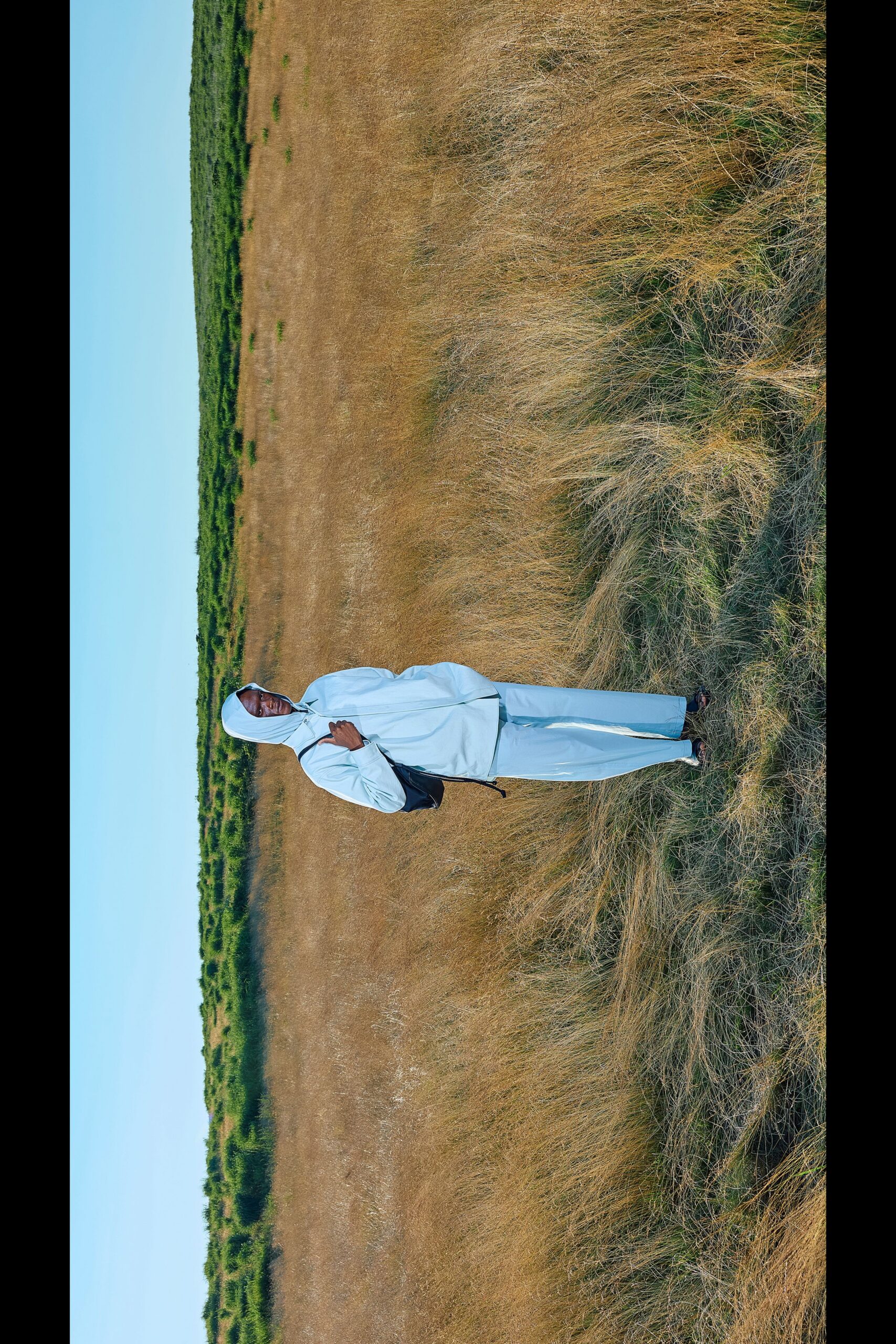 white hooded jacket with light blue pants