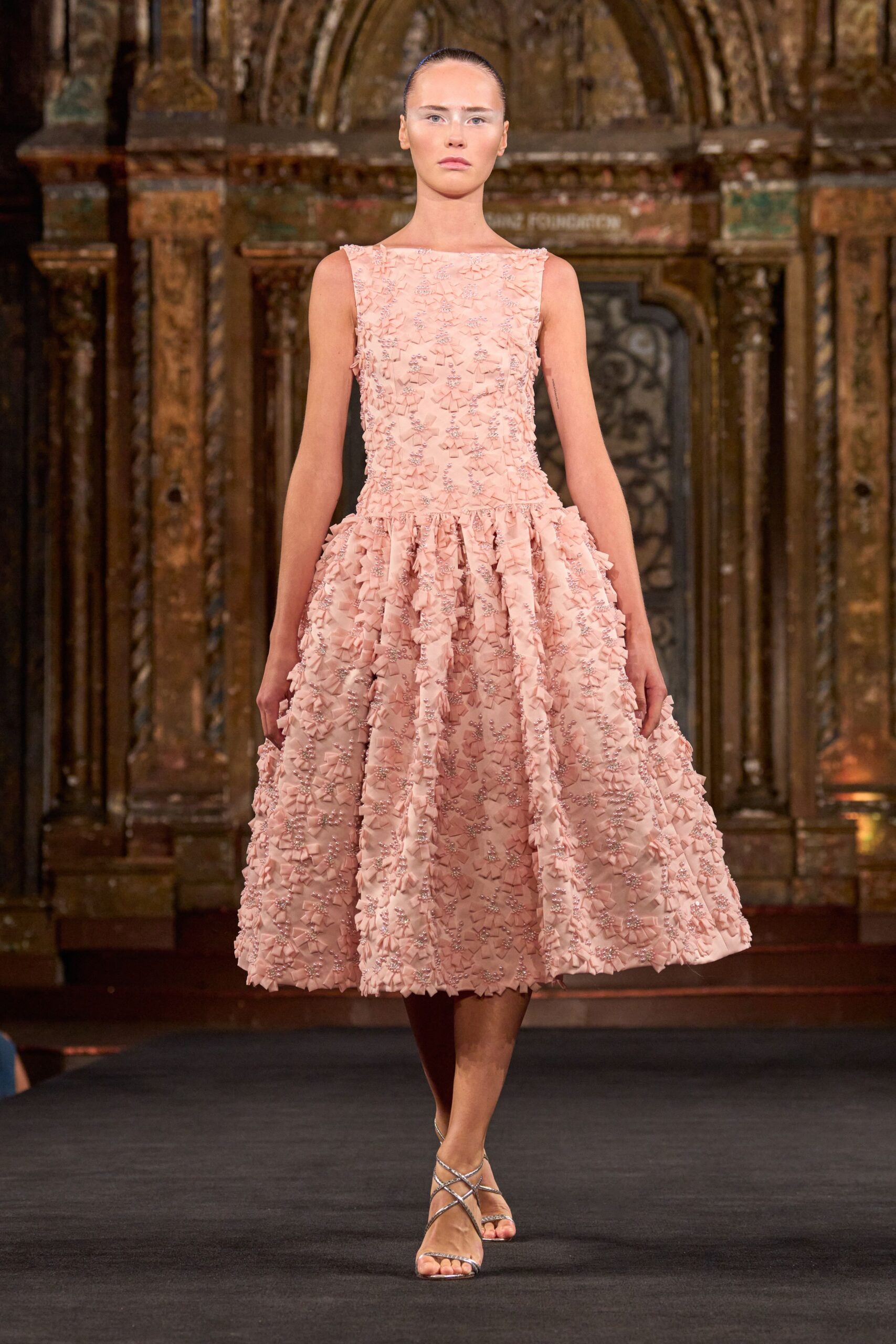 pink ruffled midi dress with strappy shoes