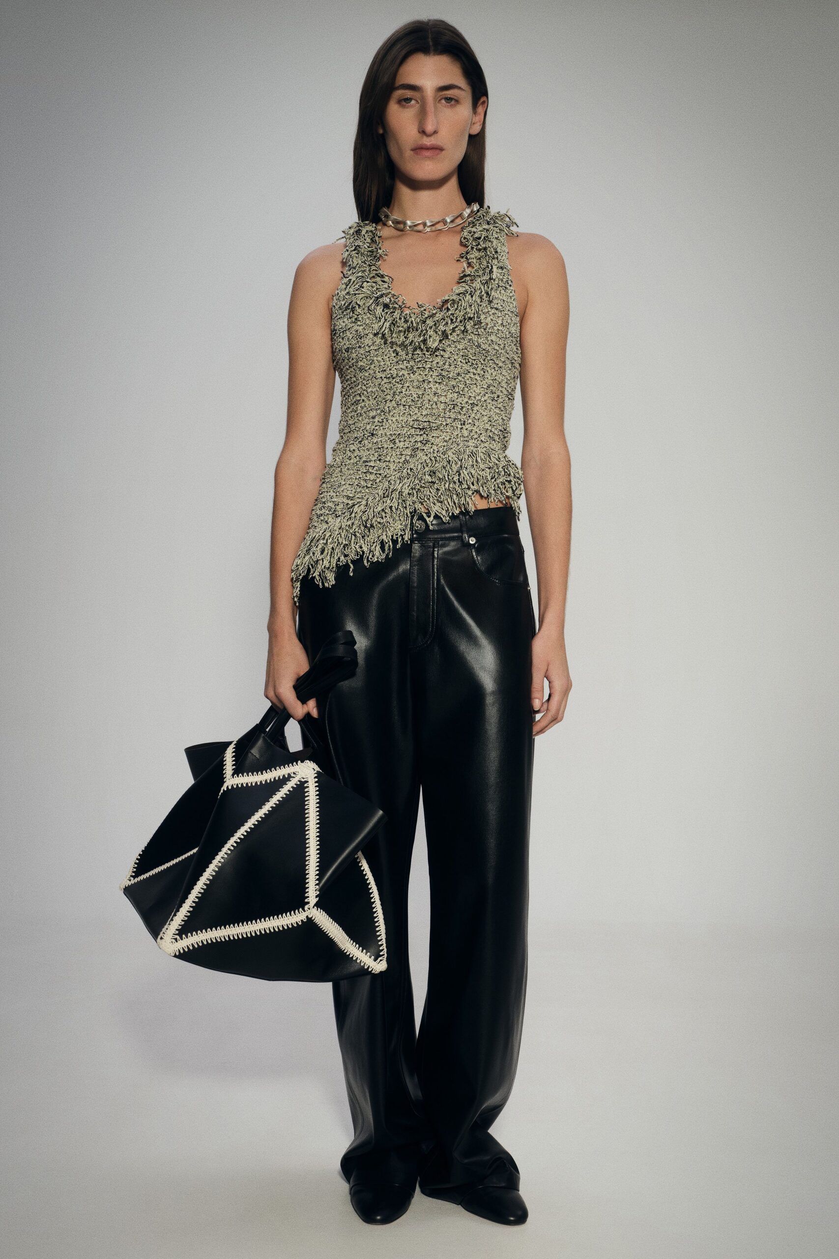 black leather relaxed pants with fringed top