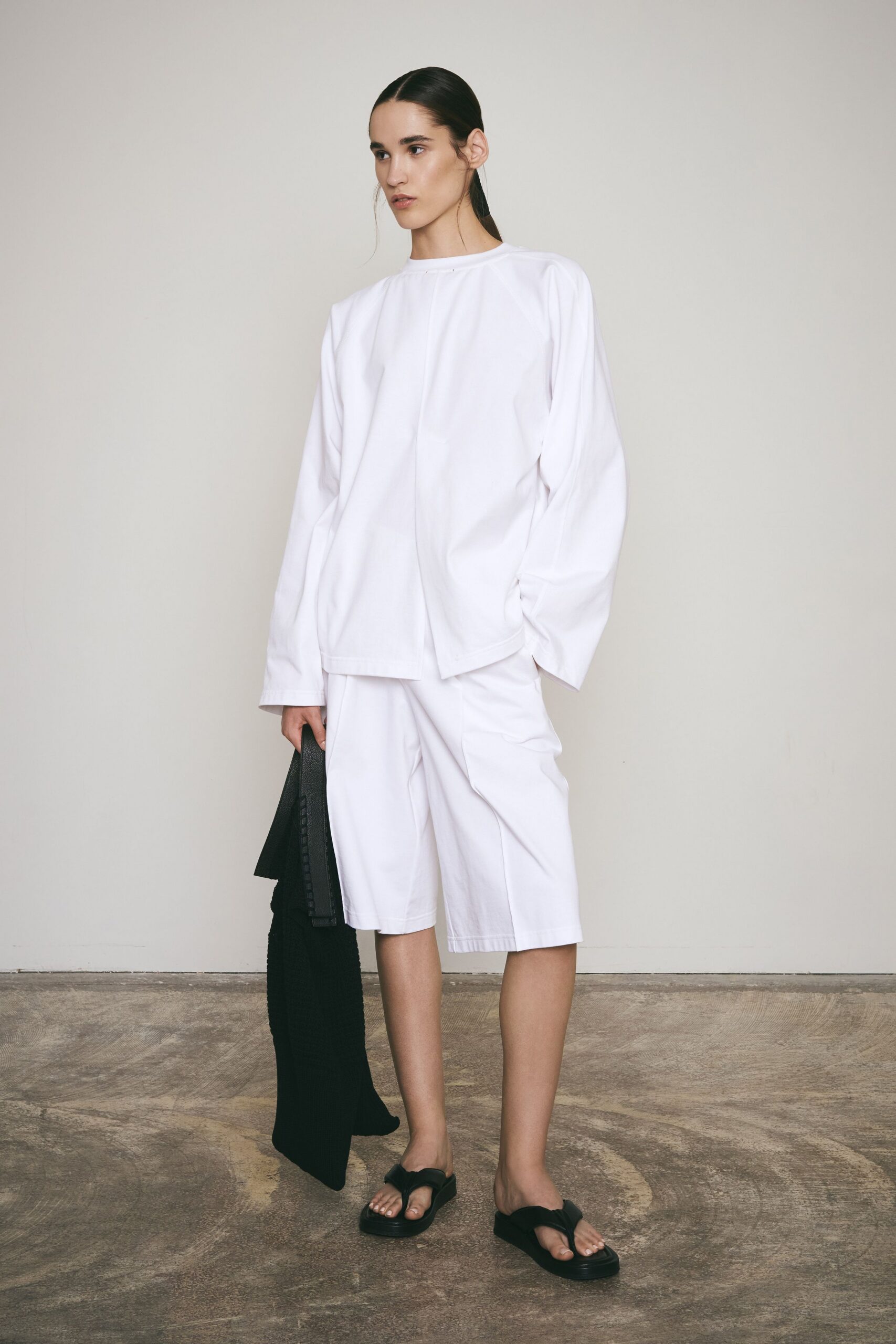 white cotton long-sleeve collared relaxed top