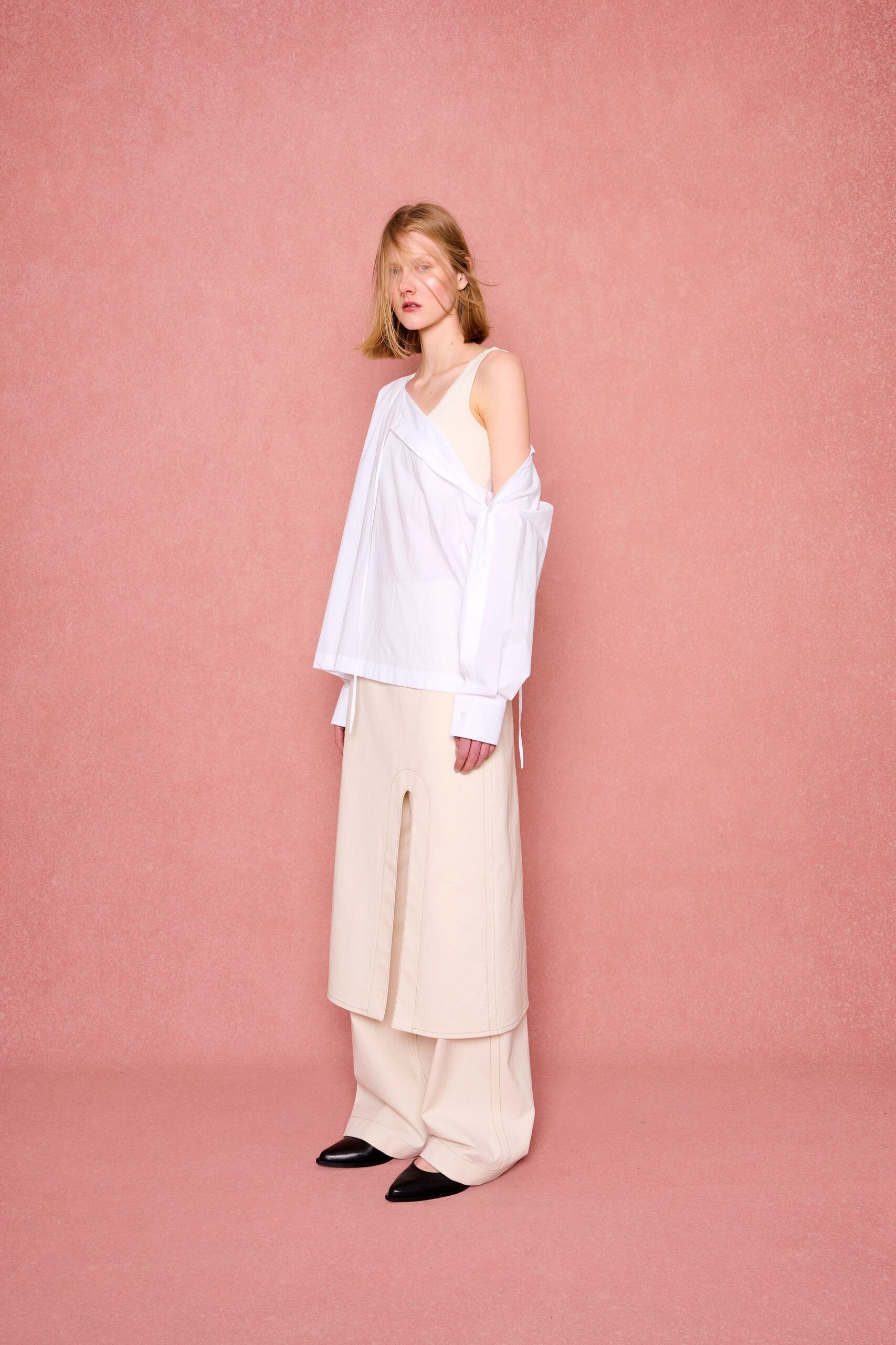 white cotton long-sleeve off-shoulder relaxed buttoned top