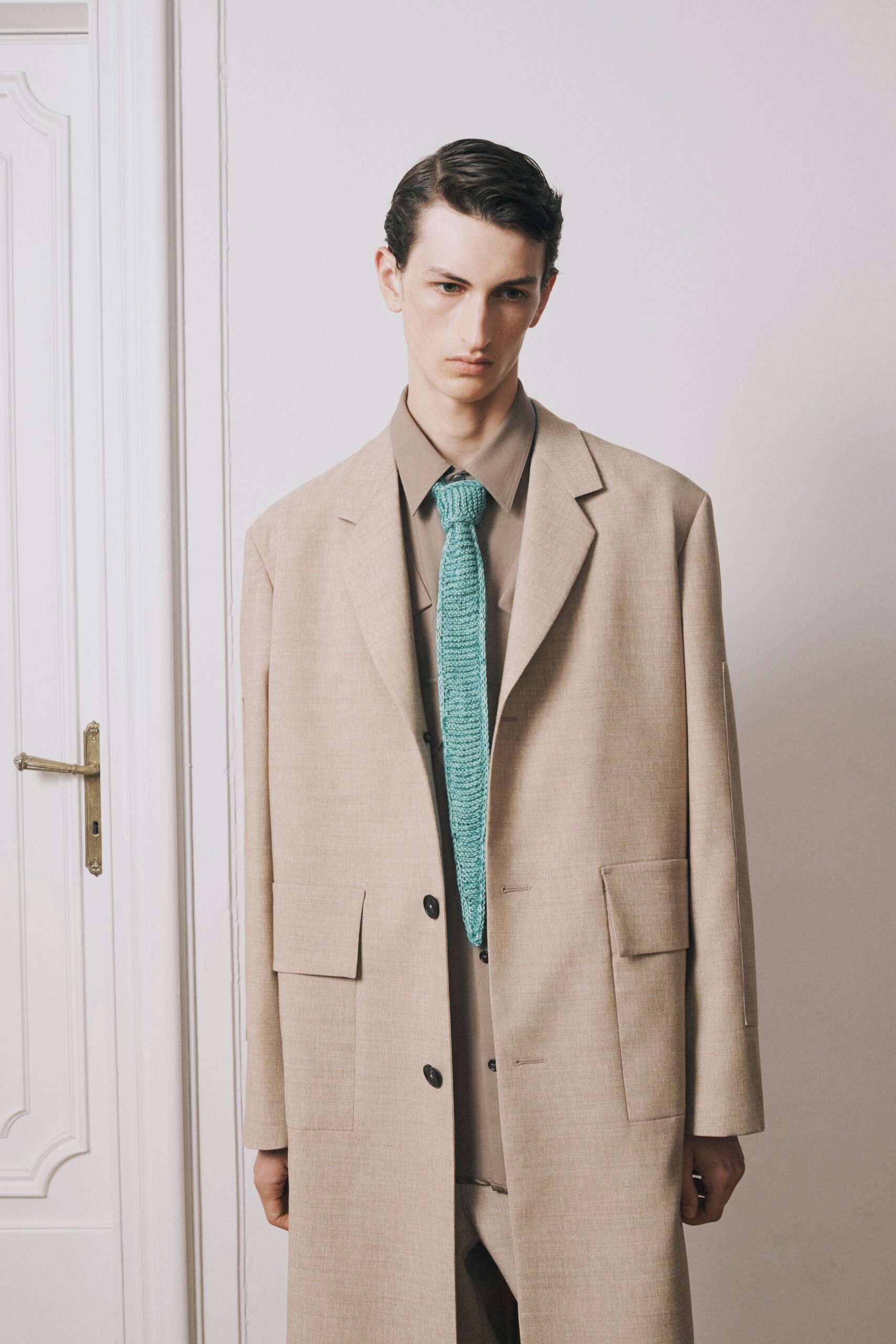 beige linen long-sleeve collared relaxed buttoned coat
