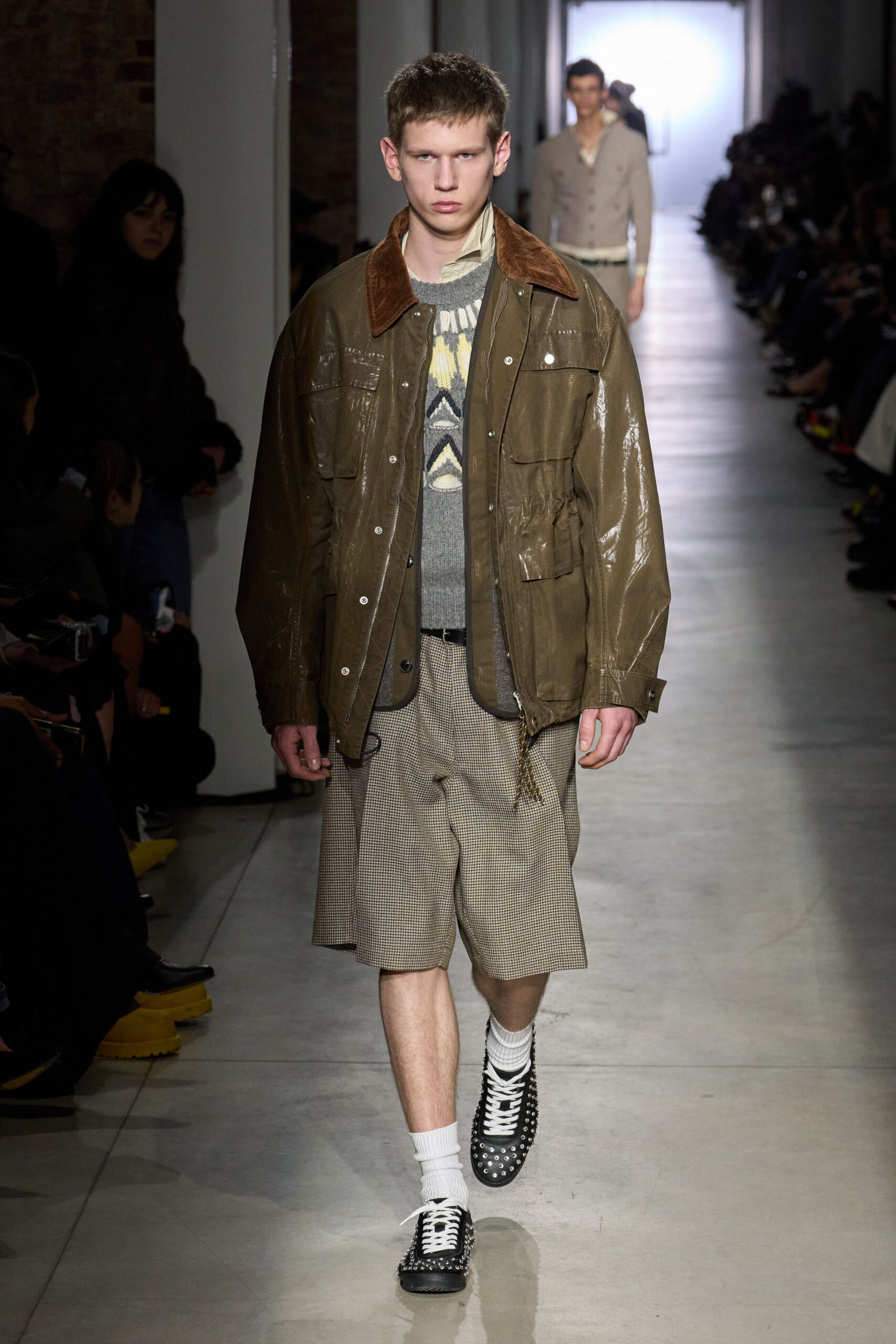 brown leather jacket with gray t-shirt
