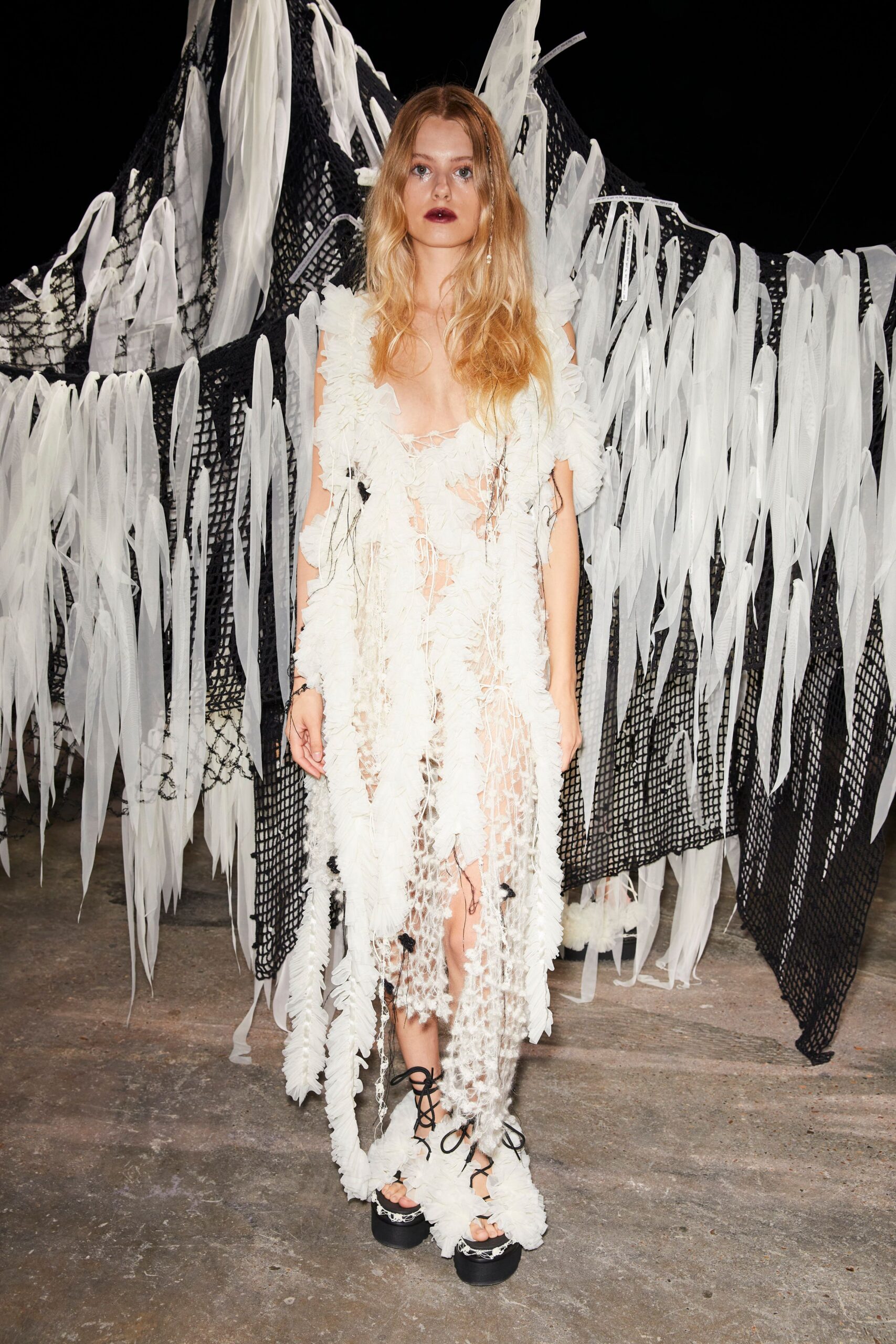 white fringed midi dress and black shoes