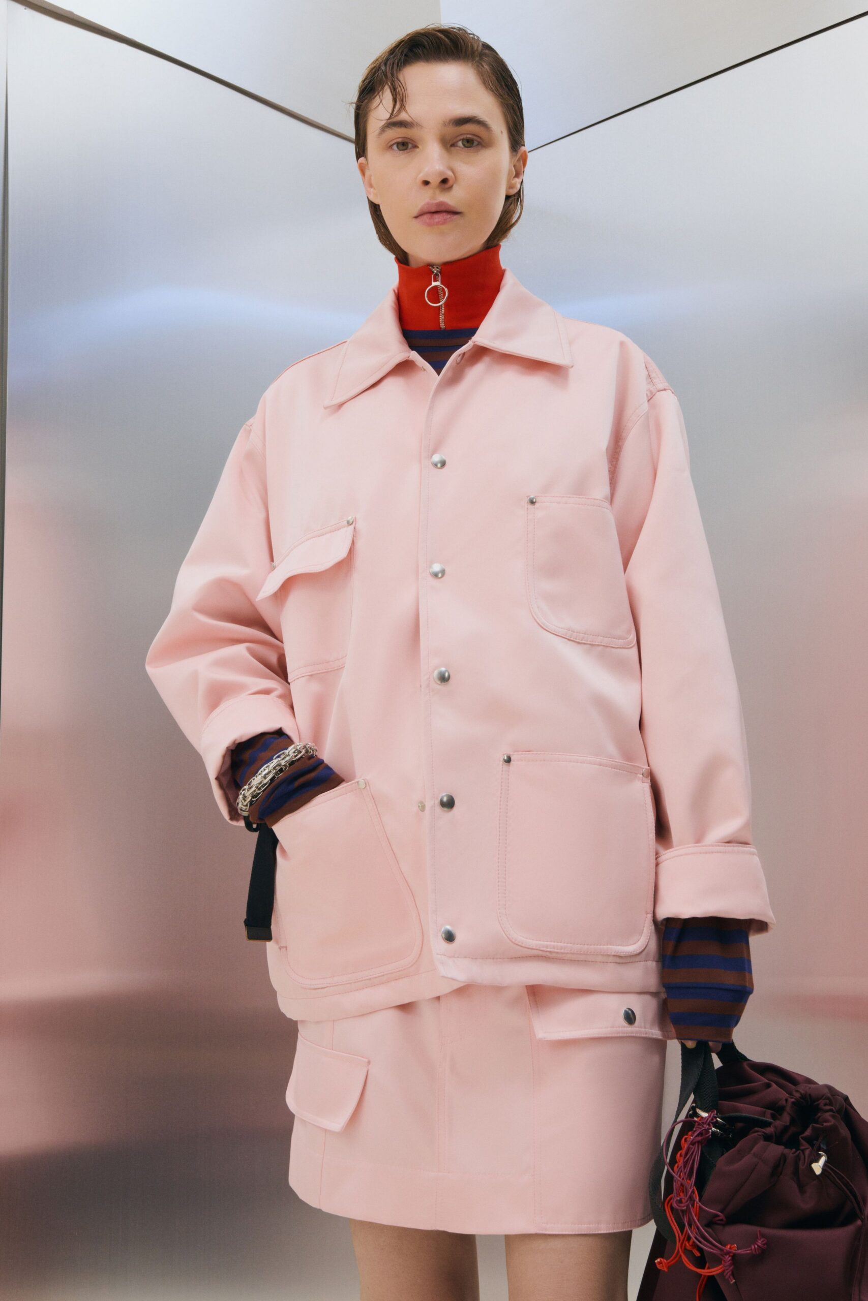 pink vinyl long-sleeve collared relaxed pockets jacket