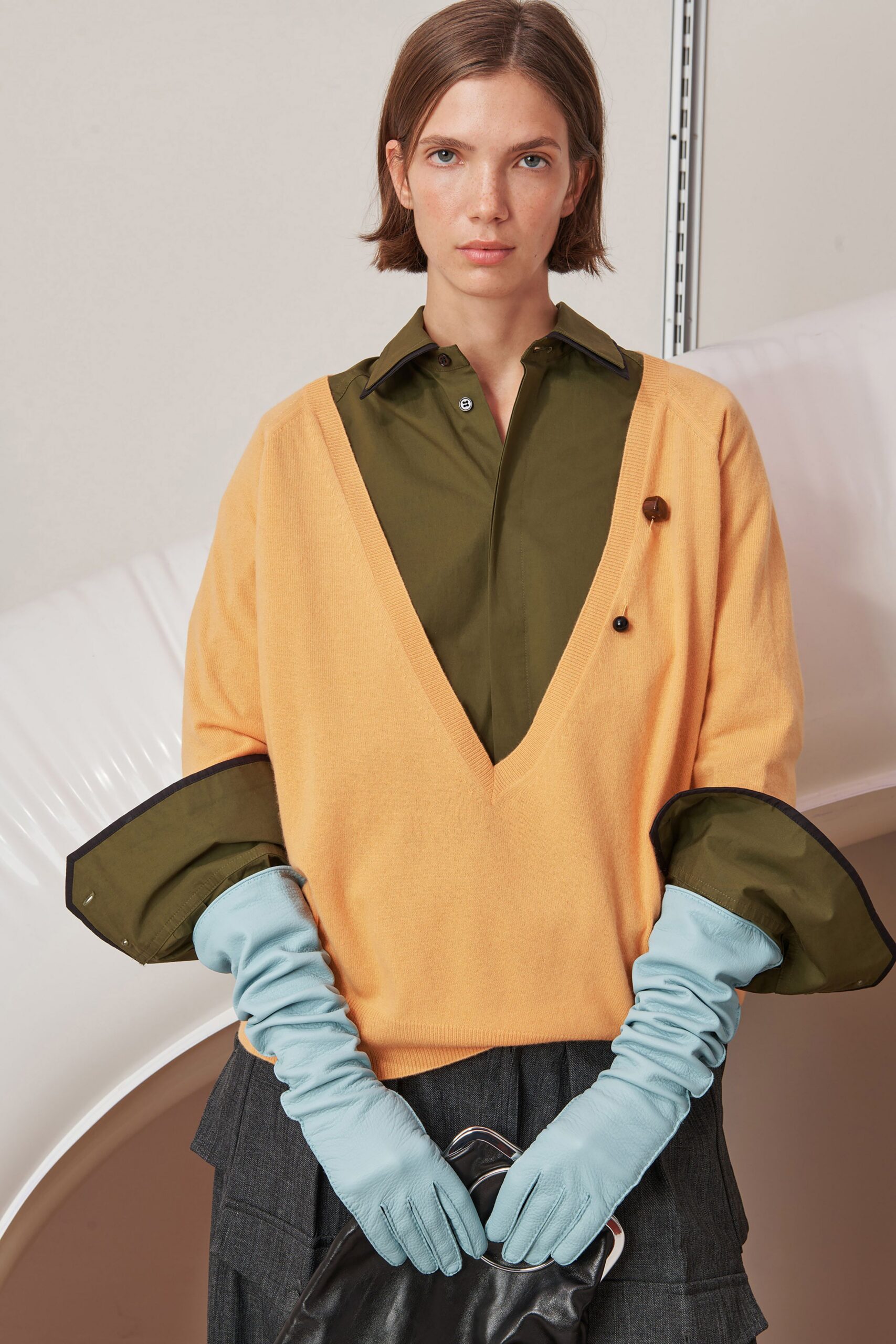 orange relaxed top with green shirt