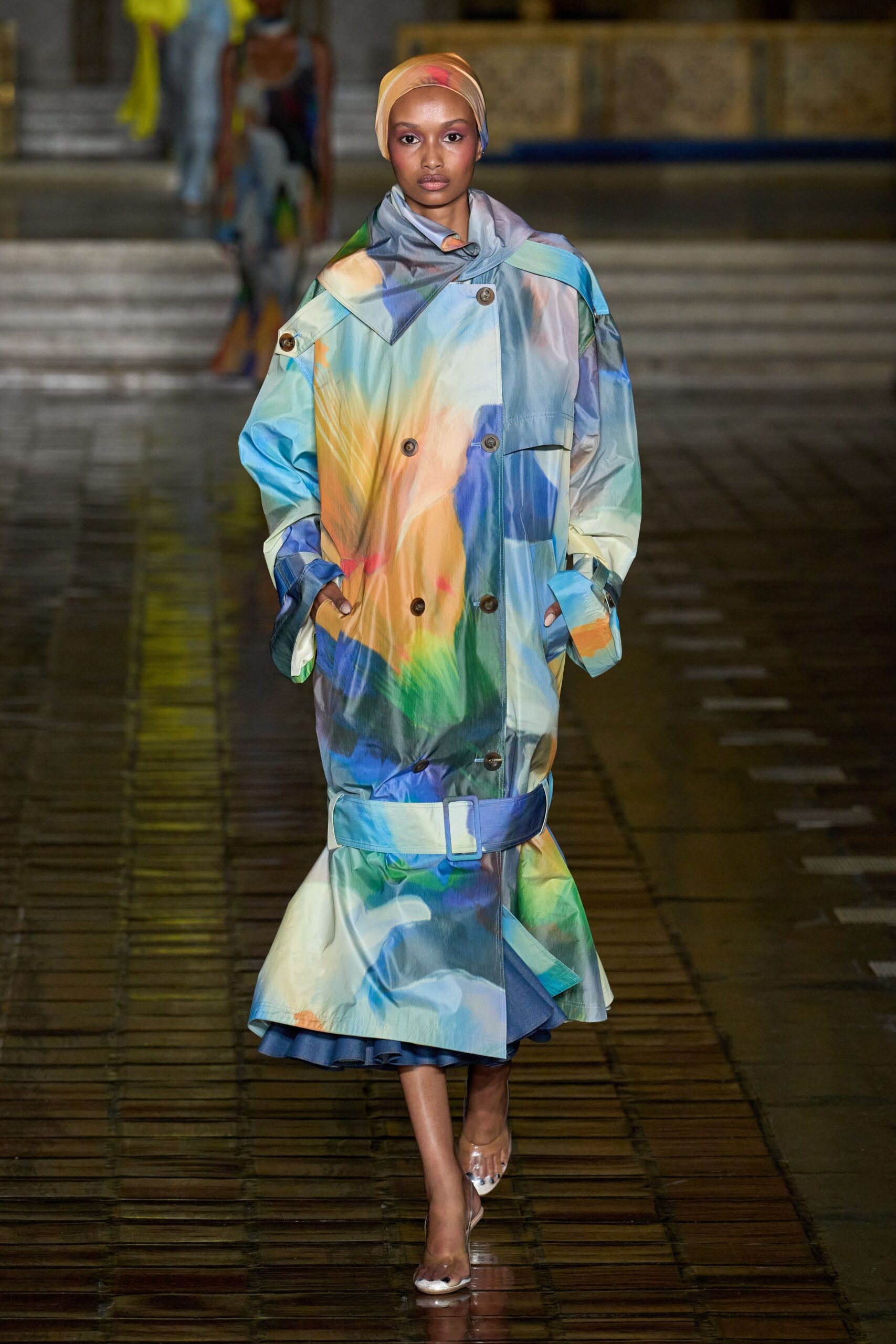 multi-colored vinyl coat with clear shoes