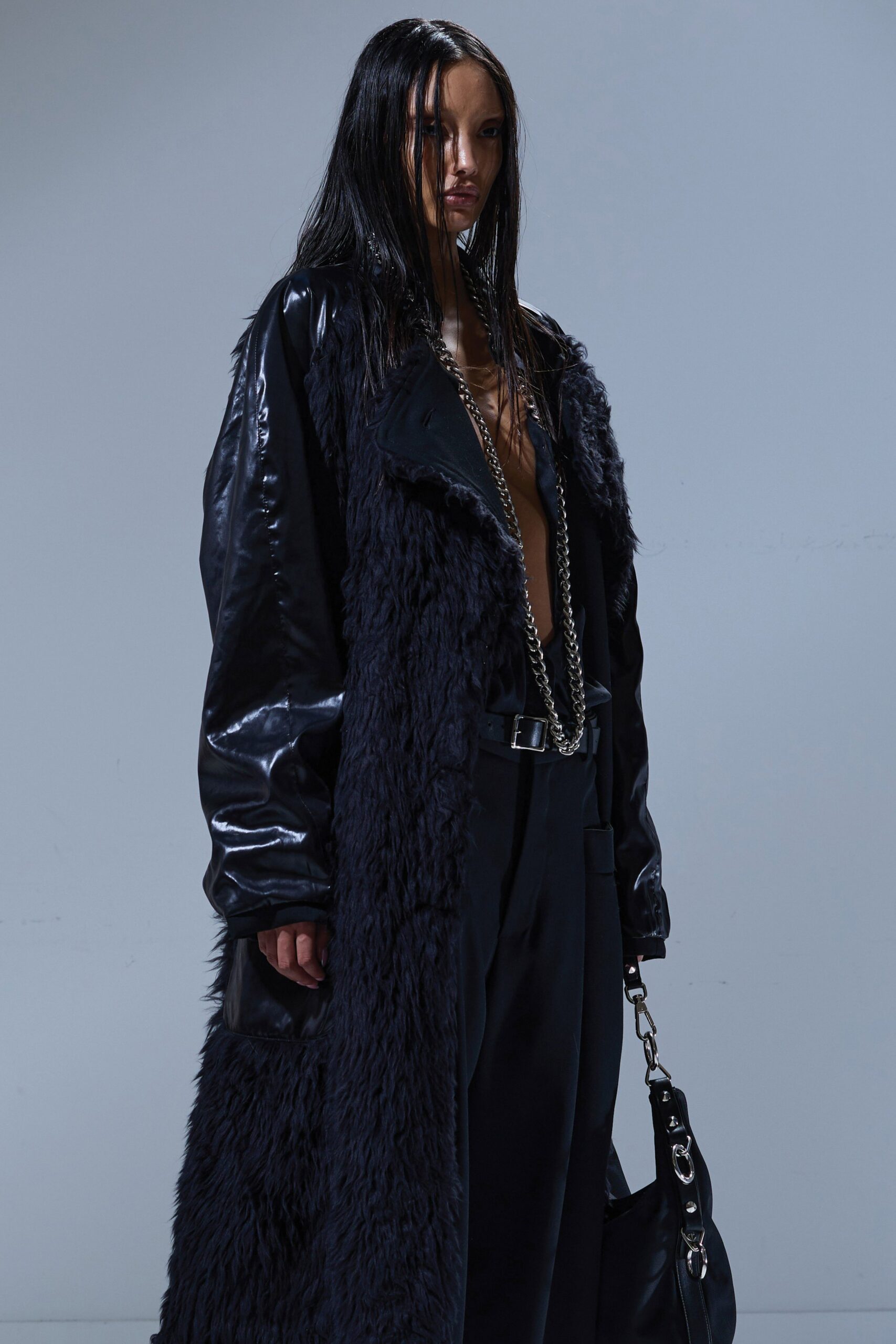 black leather long-sleeve collared relaxed layered coat