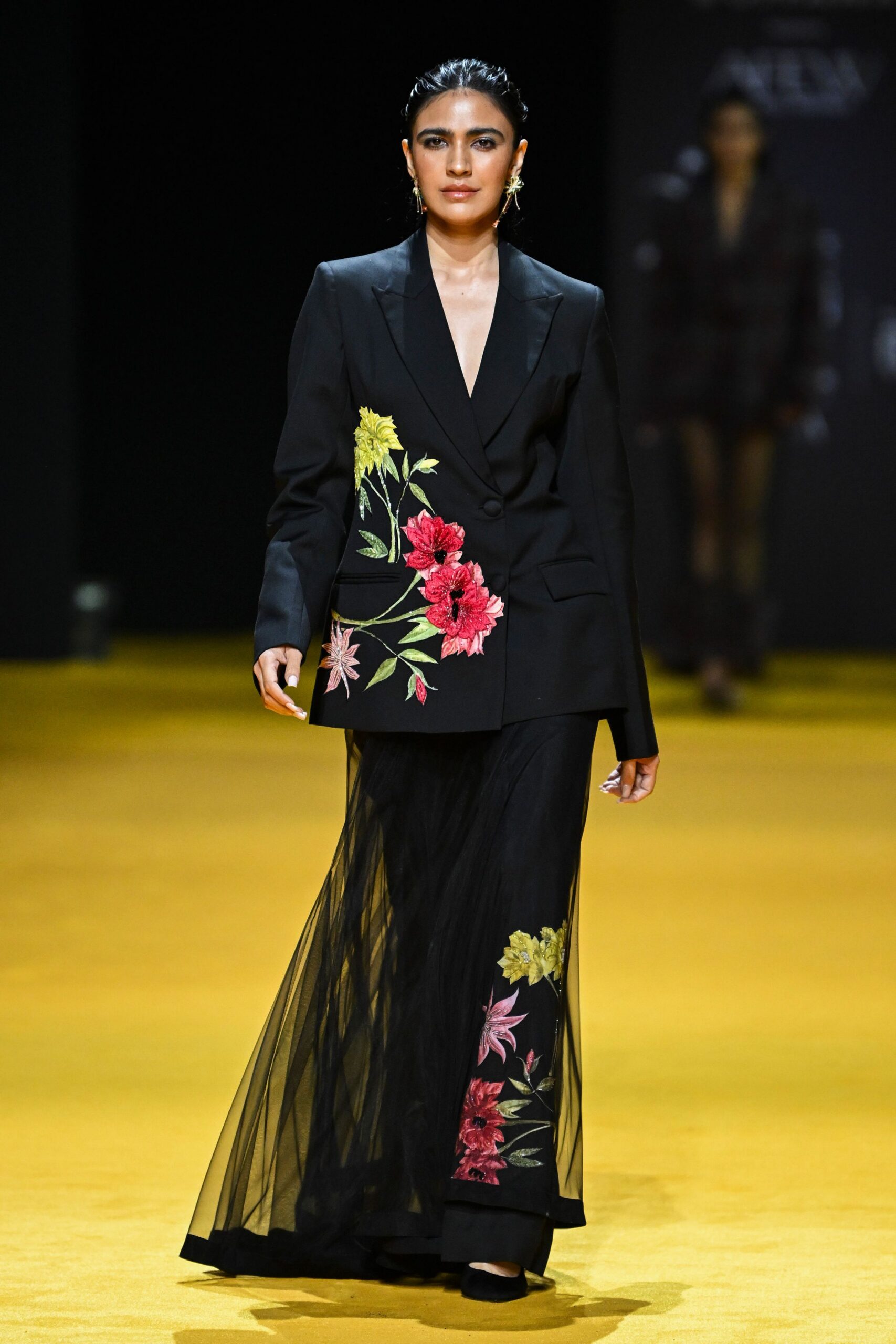 black embroidered blazer and skirt