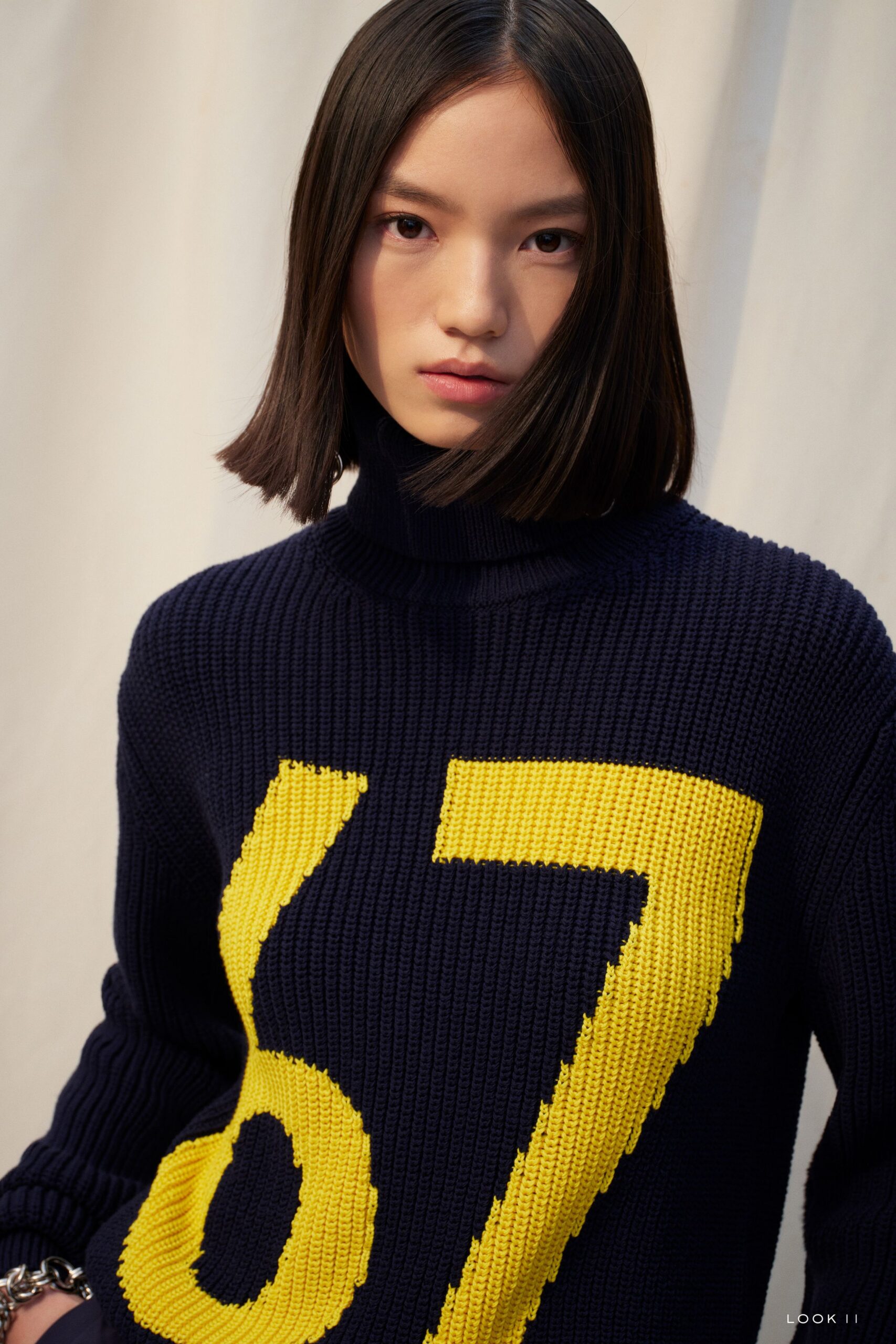 navy yellow printed relaxed sweater