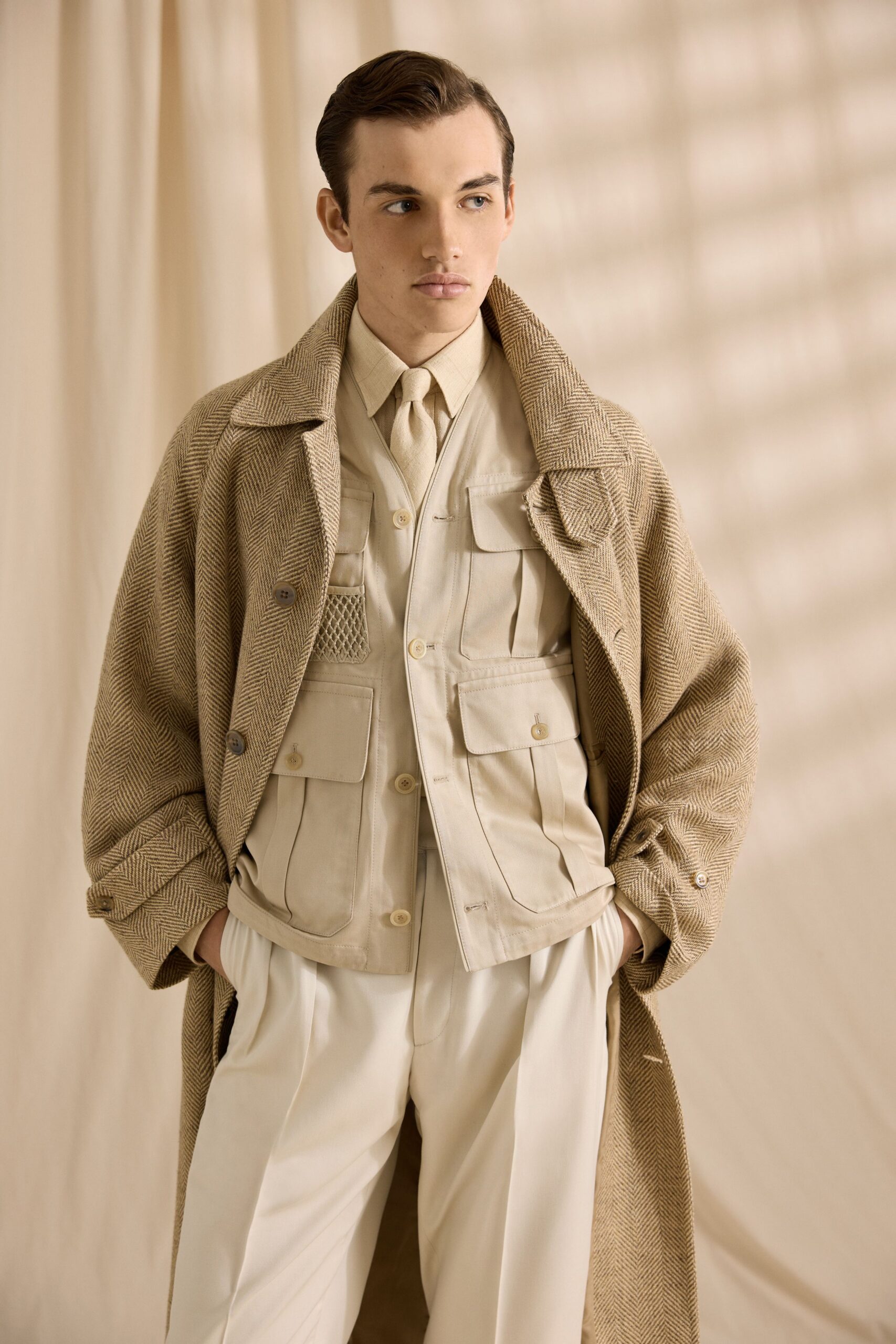 beige coat and white outfit