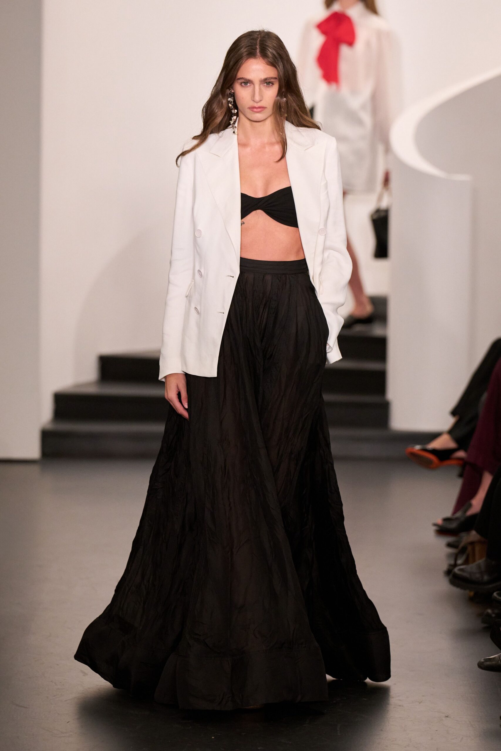 white tailored blazer black top black skirt