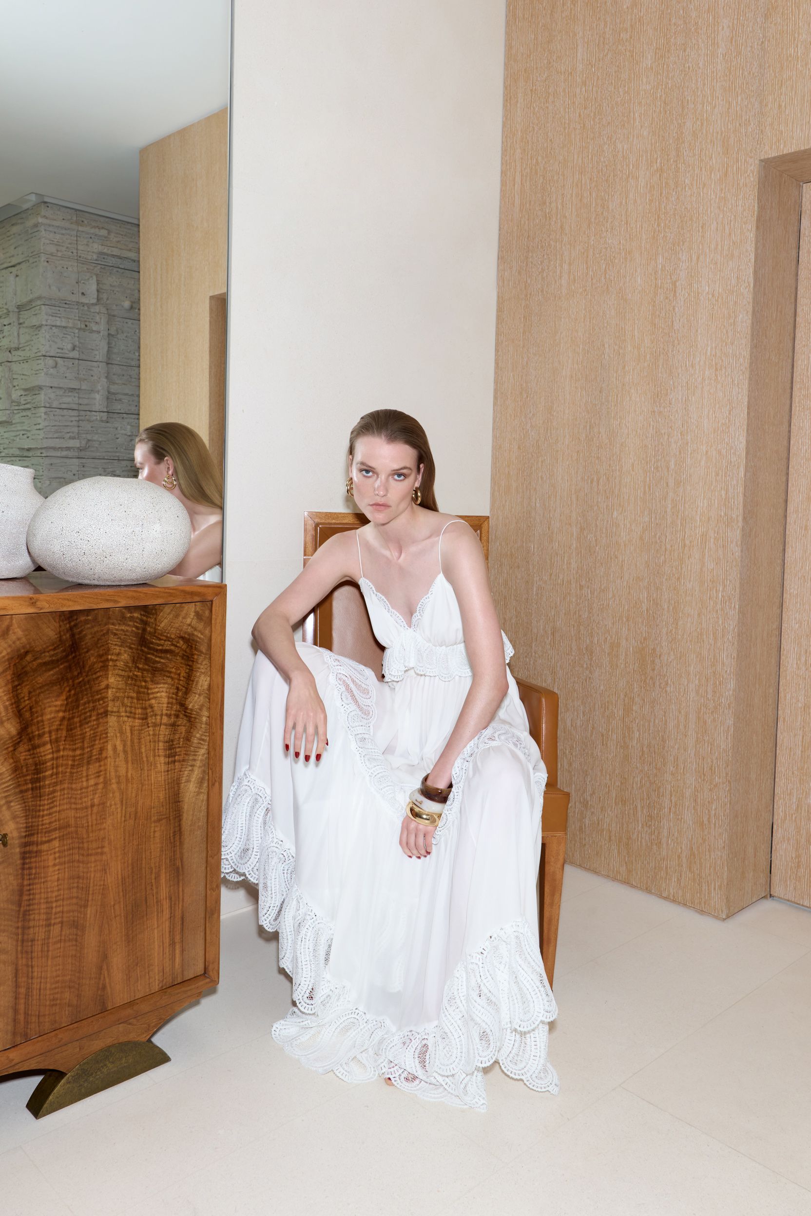 white chiffon sleeveless gown