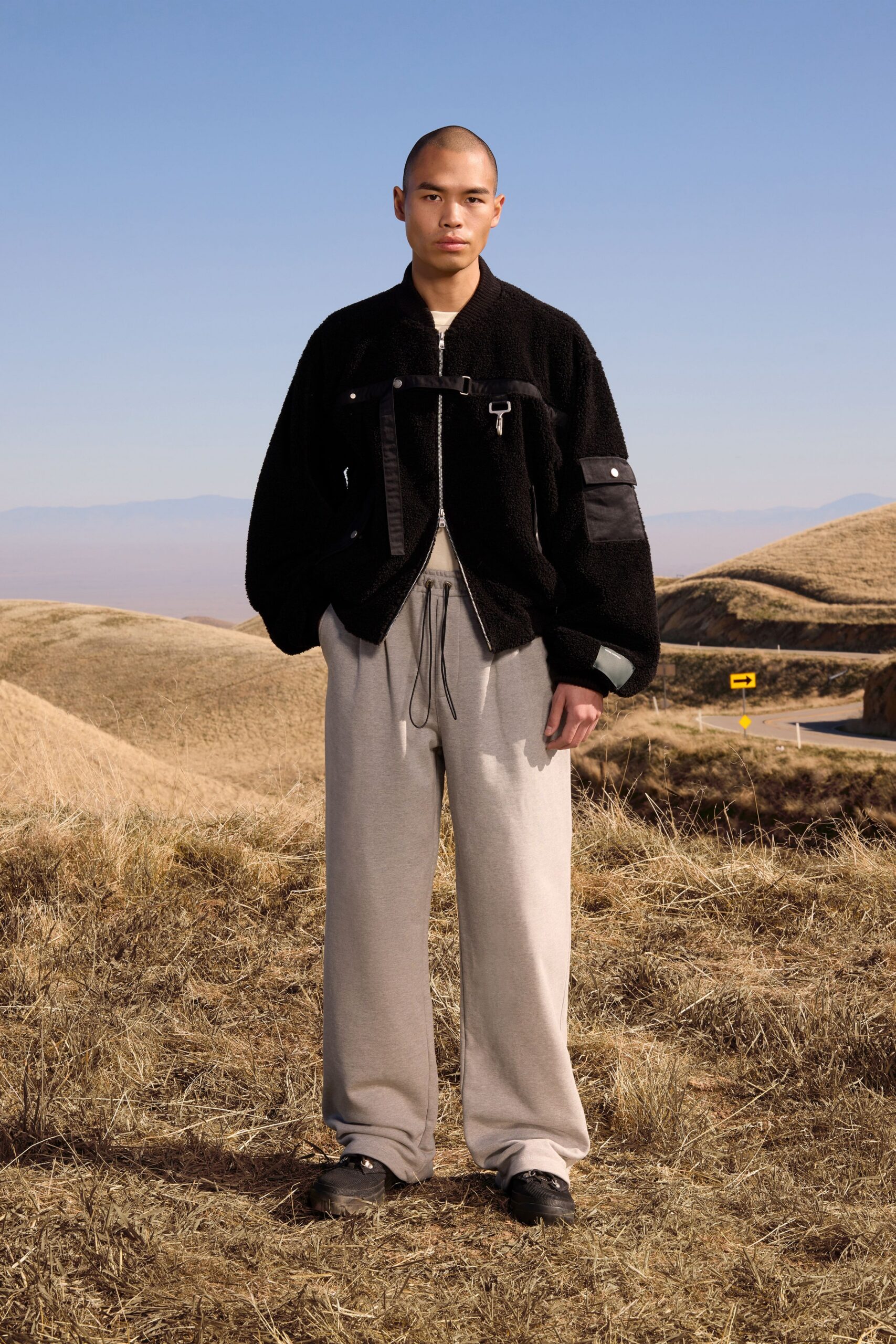 black faux-fur long-sleeve collared oversized jacket