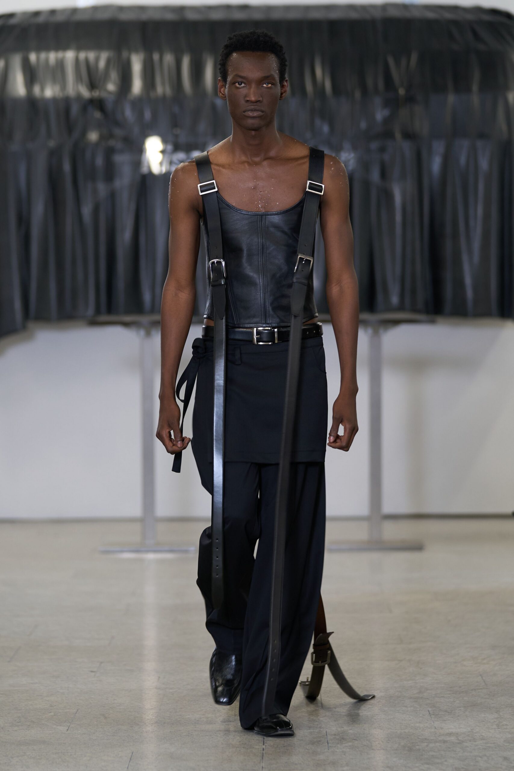 black leather fitted top with relaxed pants