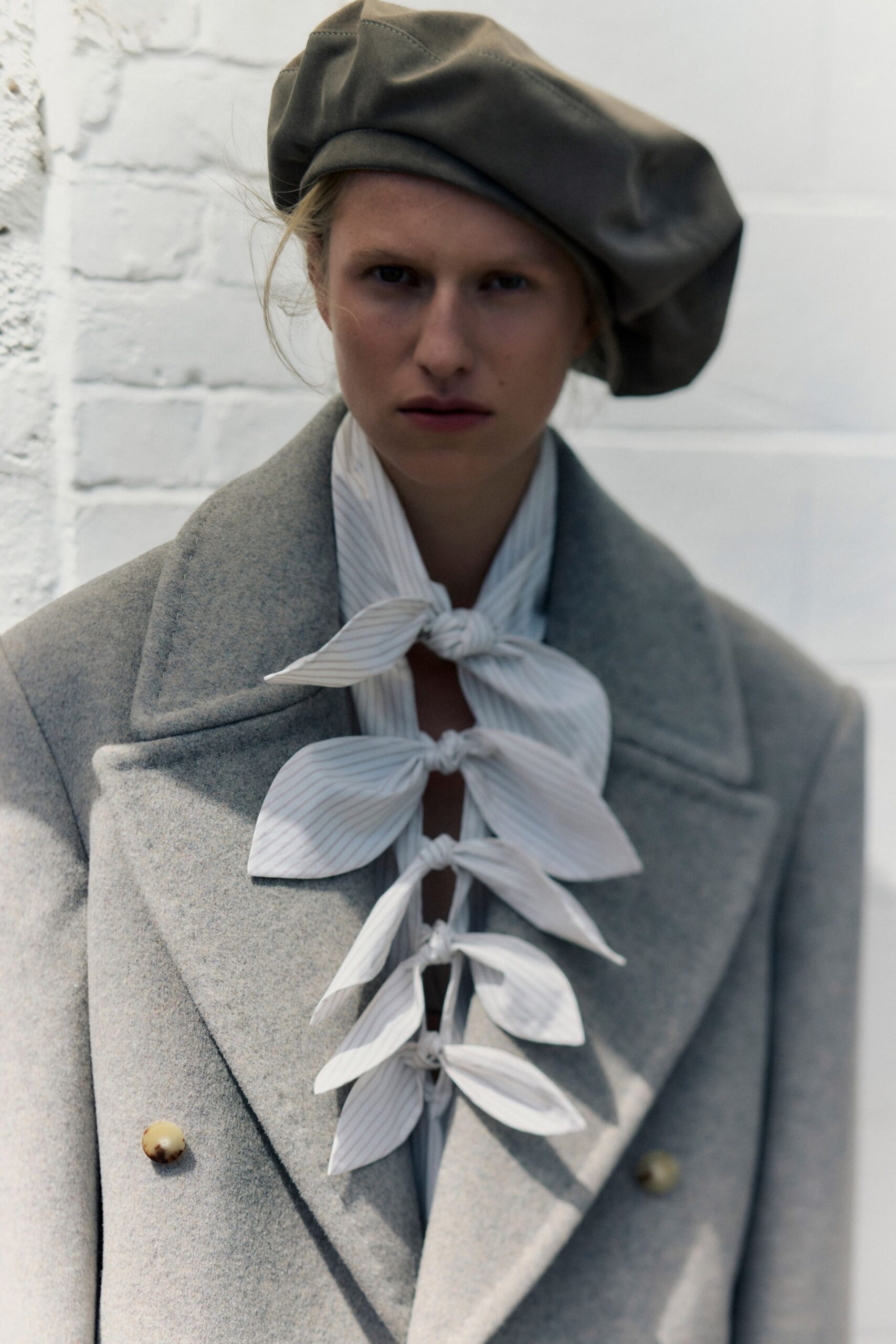 gray wool long-sleeve collared structured buttoned coat