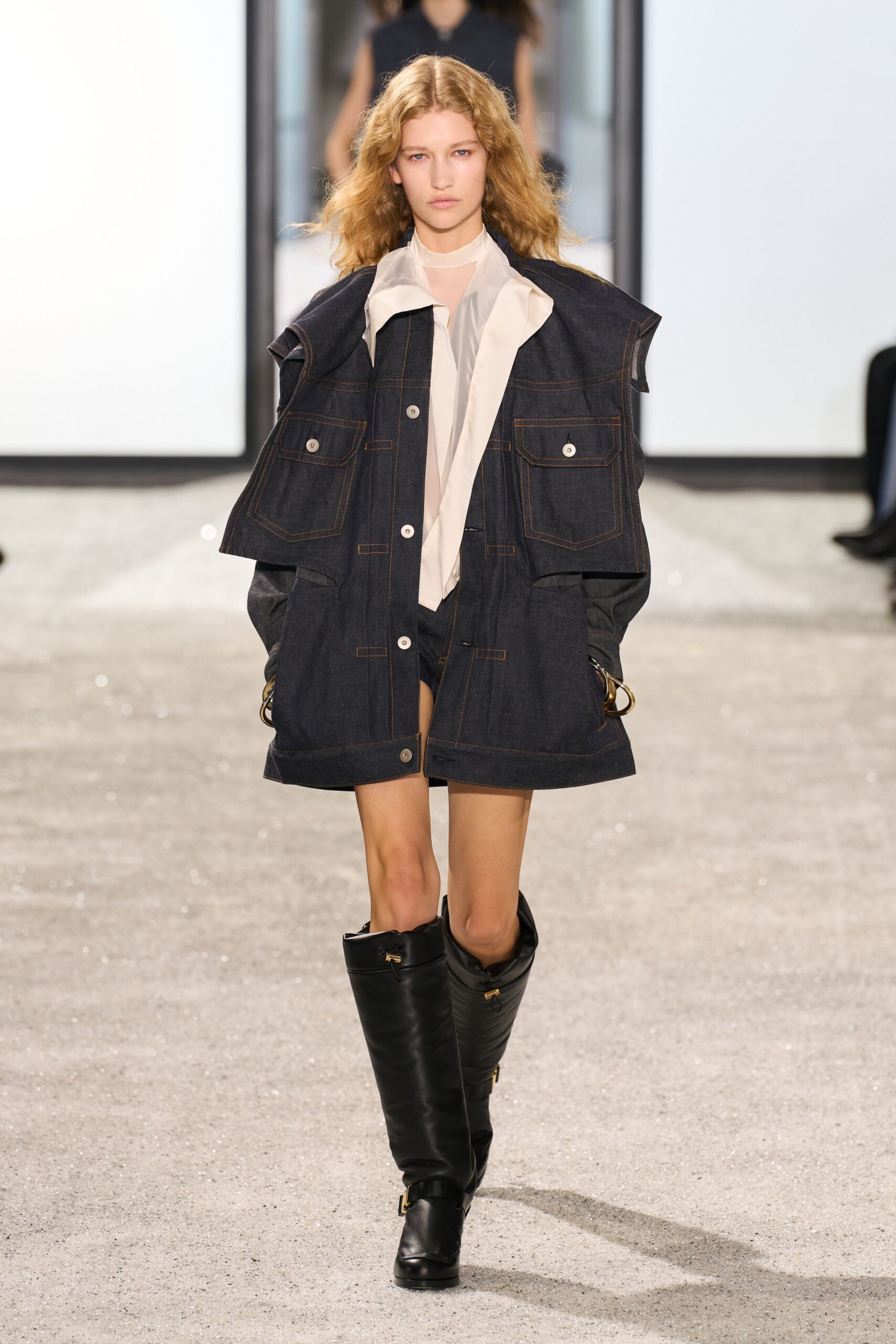 blue denim jacket with white blouse