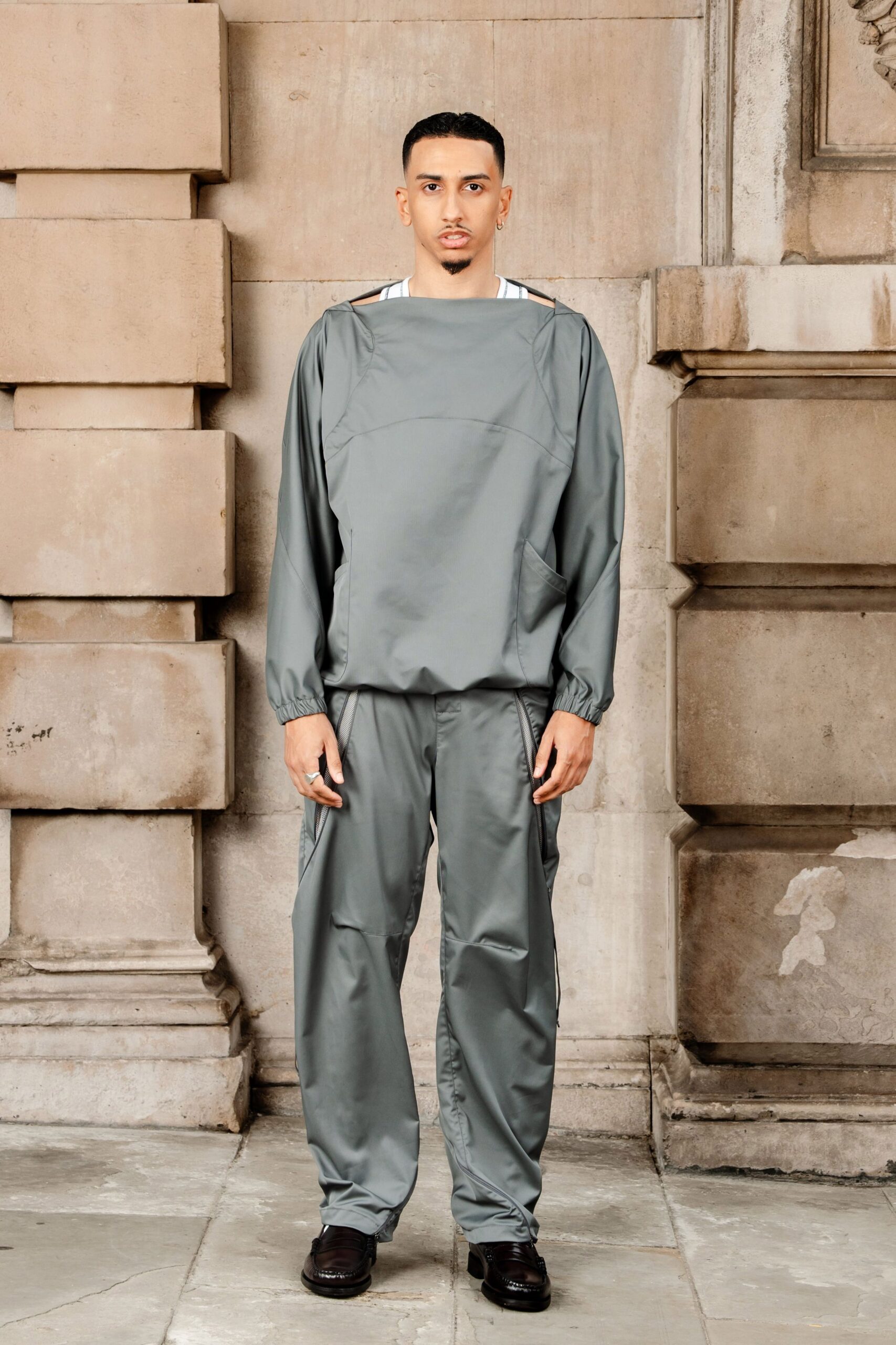 gray vinyl long-sleeve collared relaxed top
