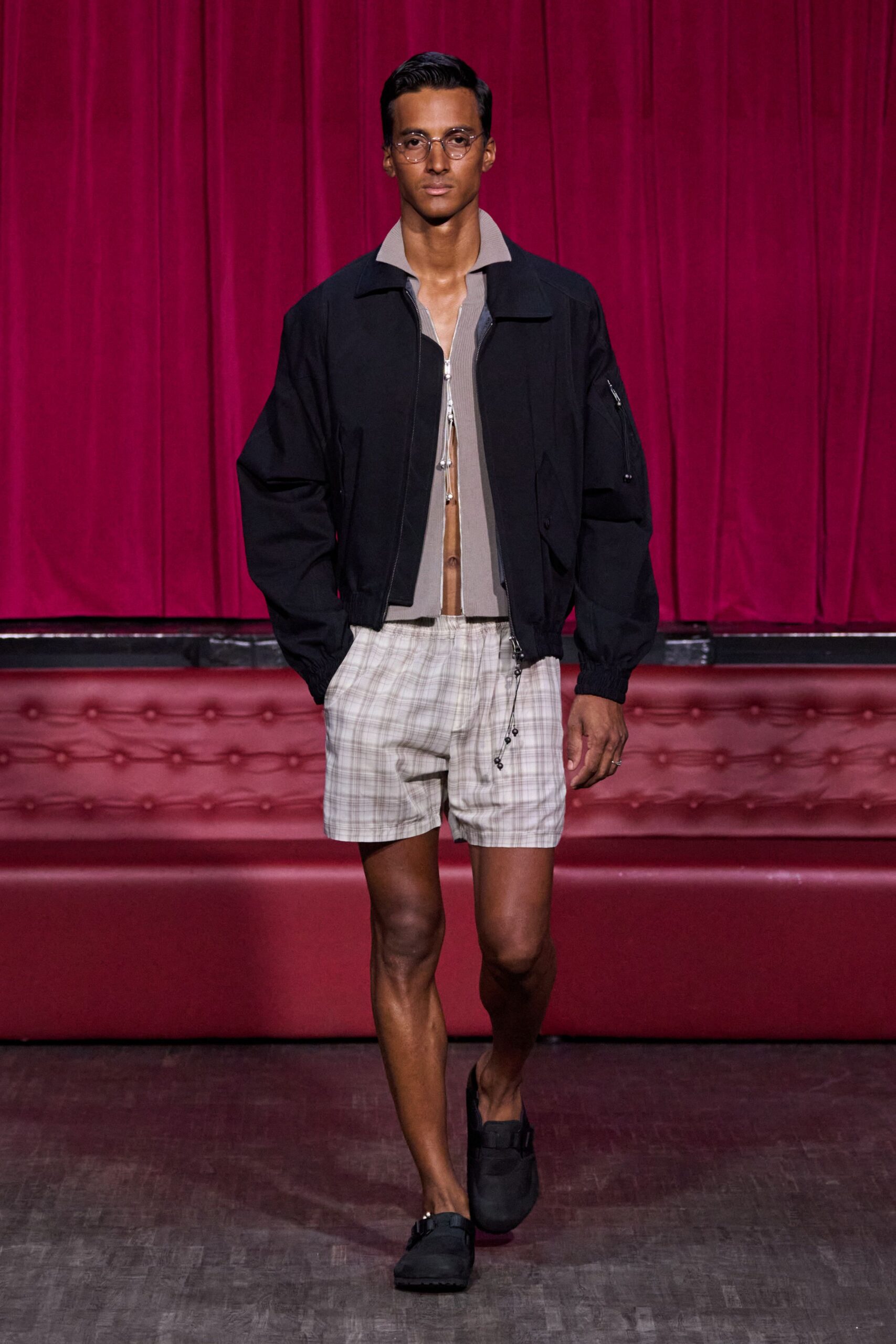 black relaxed jacket with plaid shorts