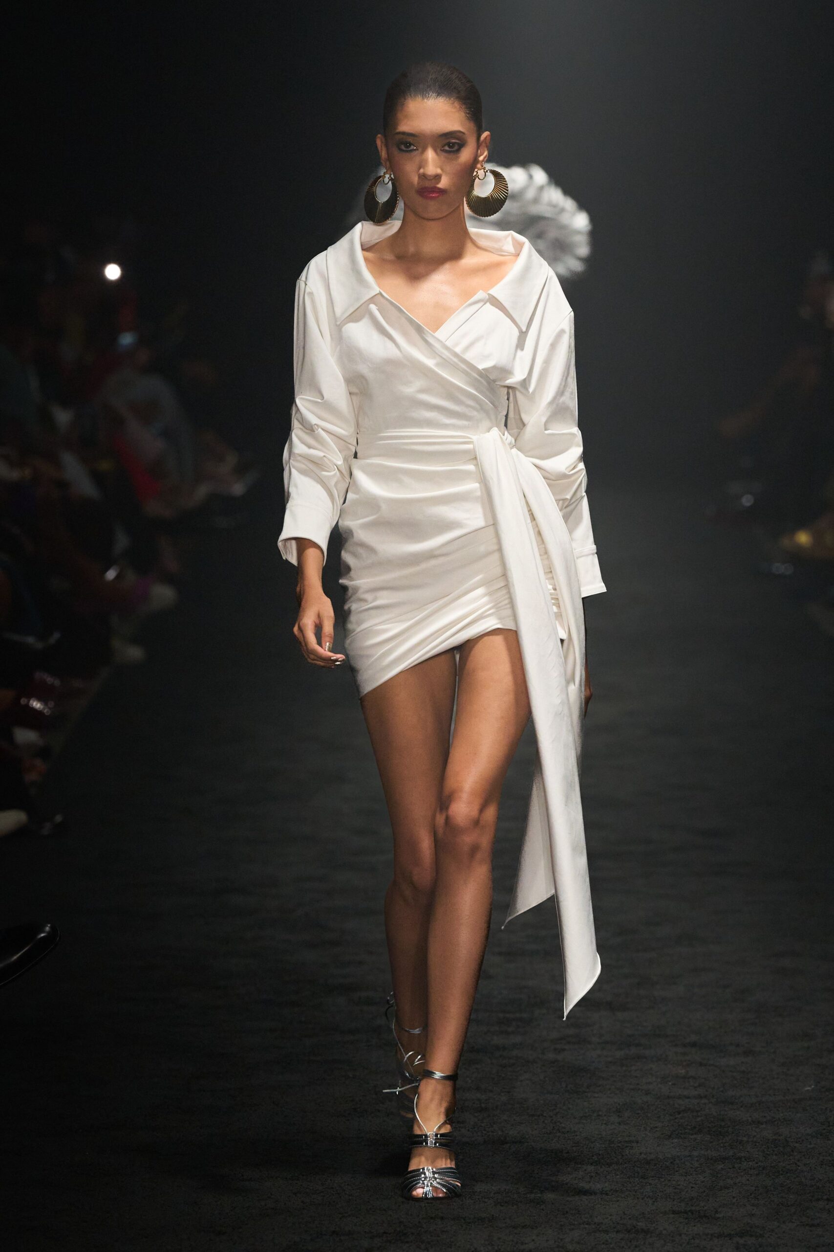 white fitted mini dress with strappy shoes