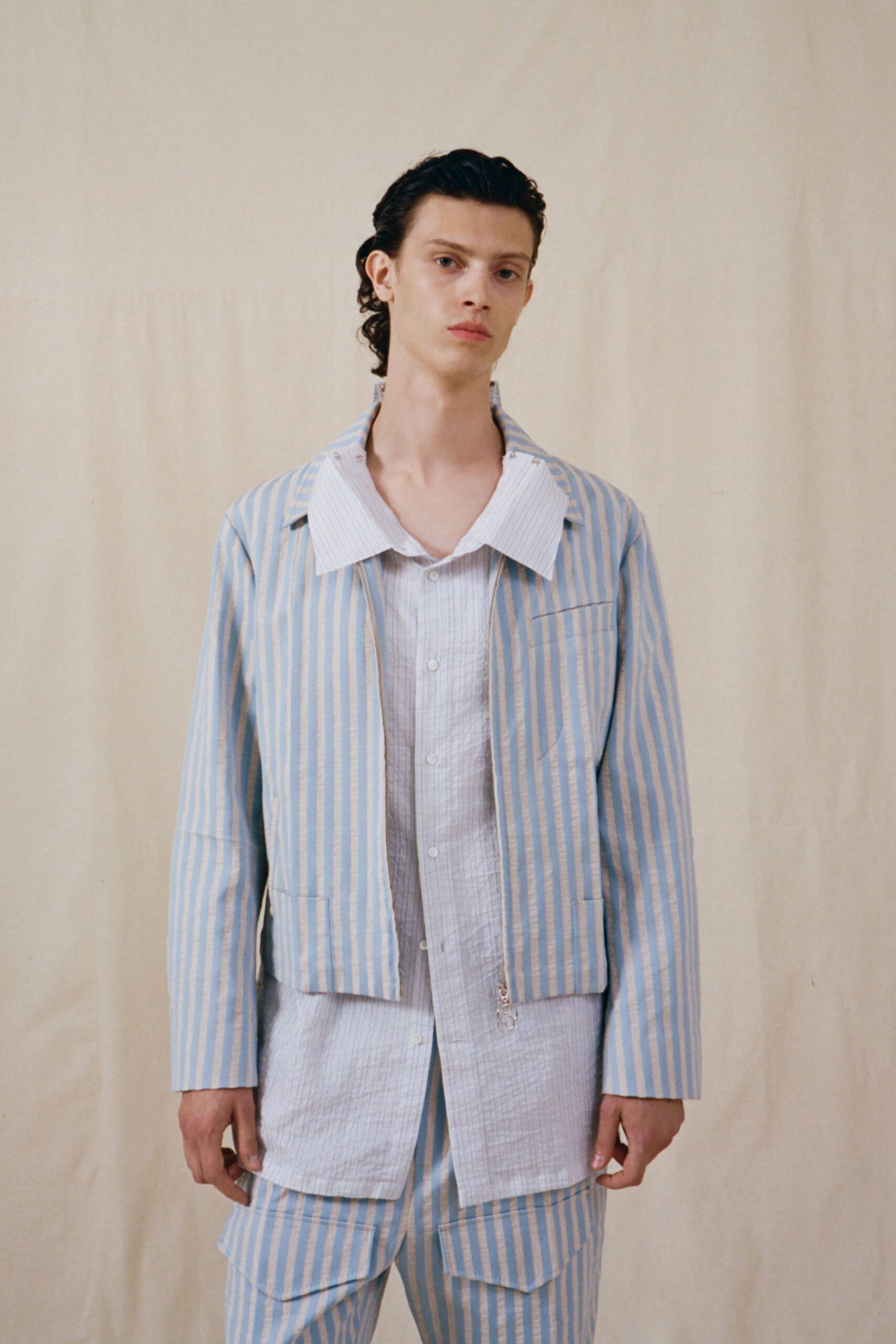 blue and white striped jacket and pants