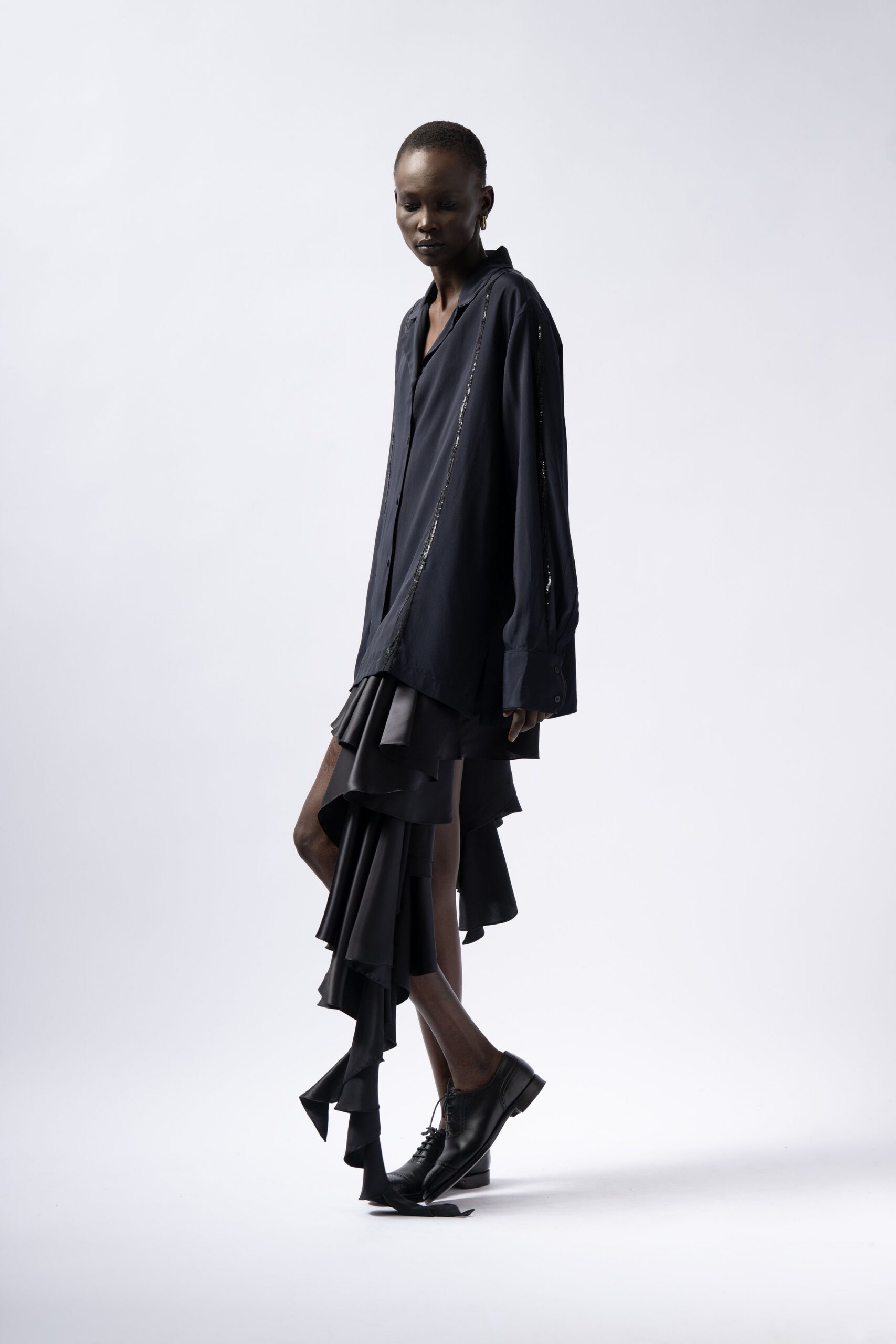 black shirt-dress with asymmetric hem