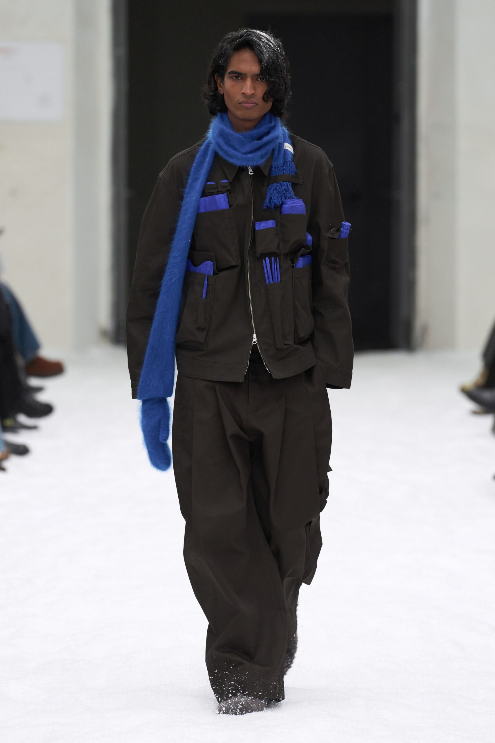 black relaxed jacket with blue scarf