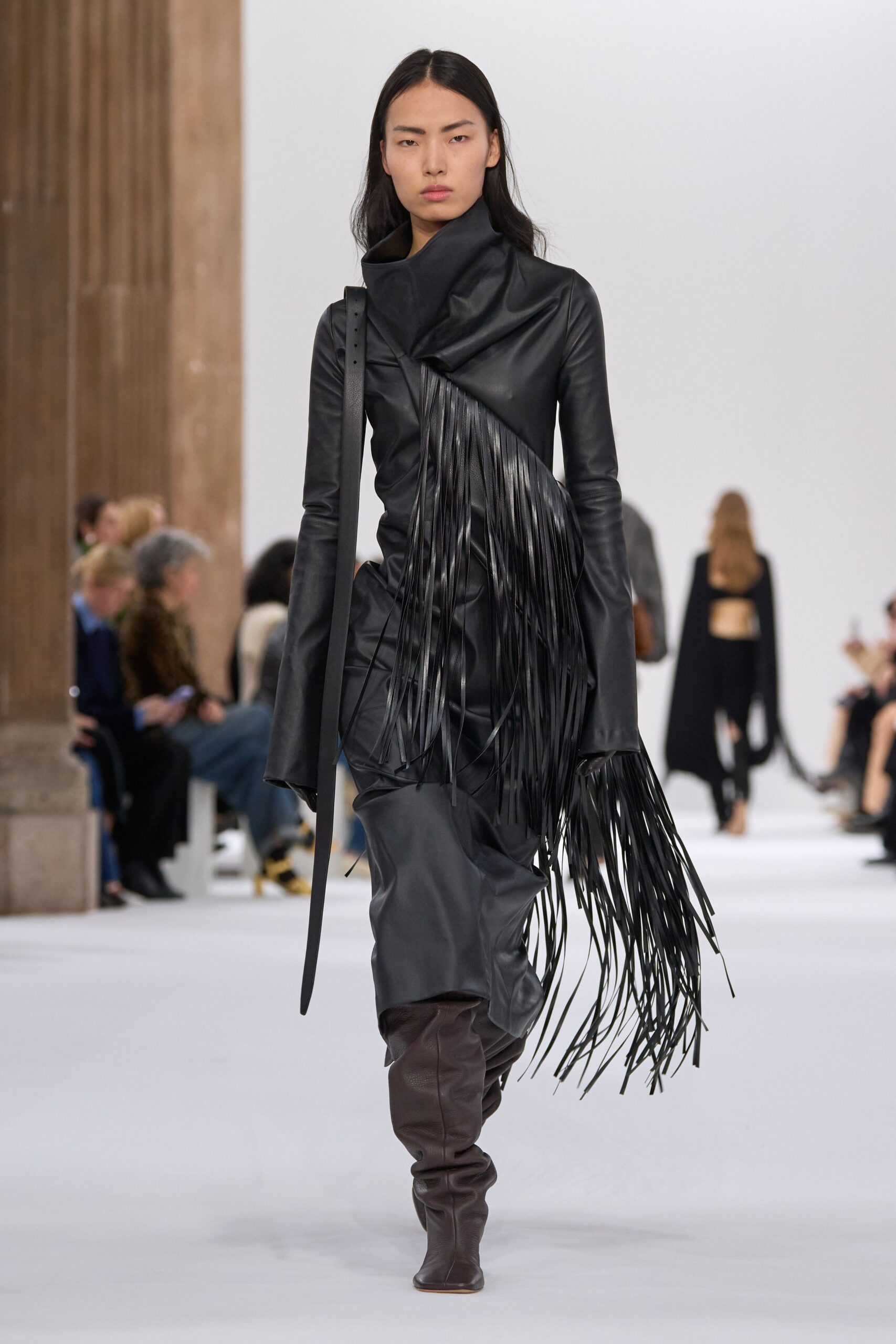 black leather fringed midi dress with brown boots