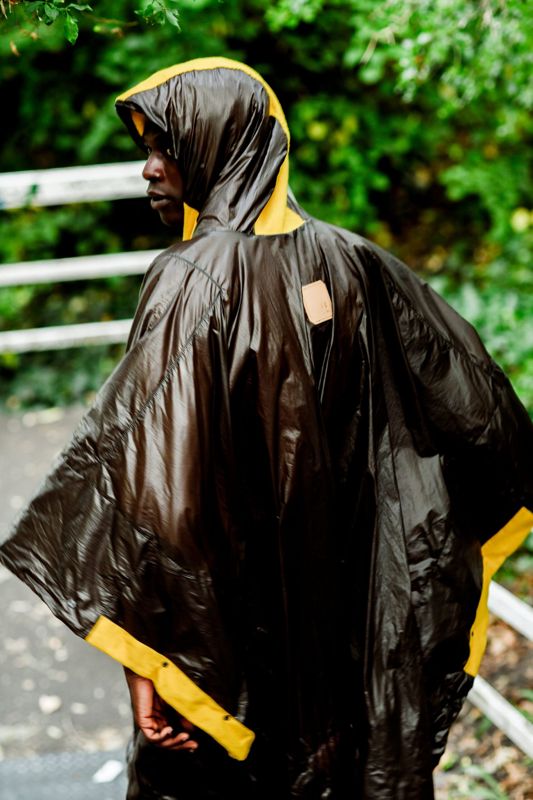 black and yellow vinyl poncho
