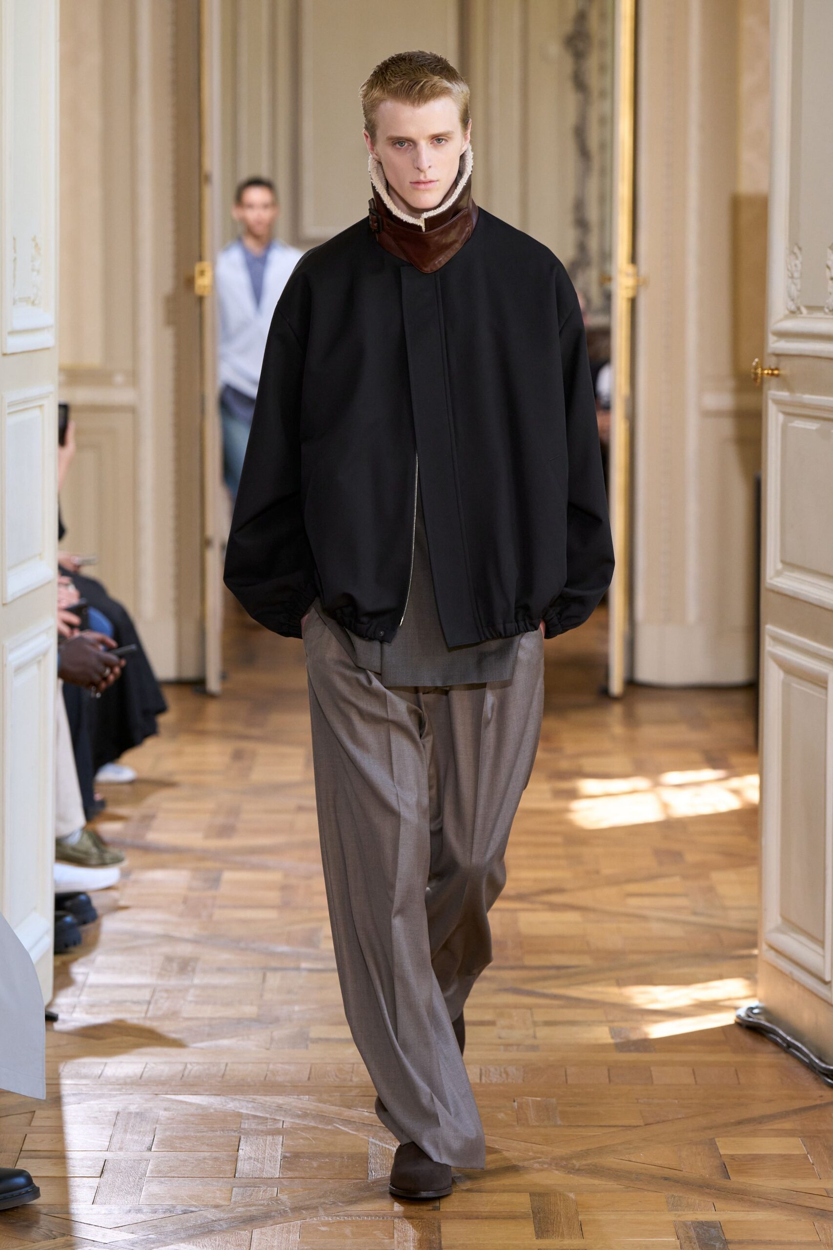 black relaxed jacket gray tailored pants
