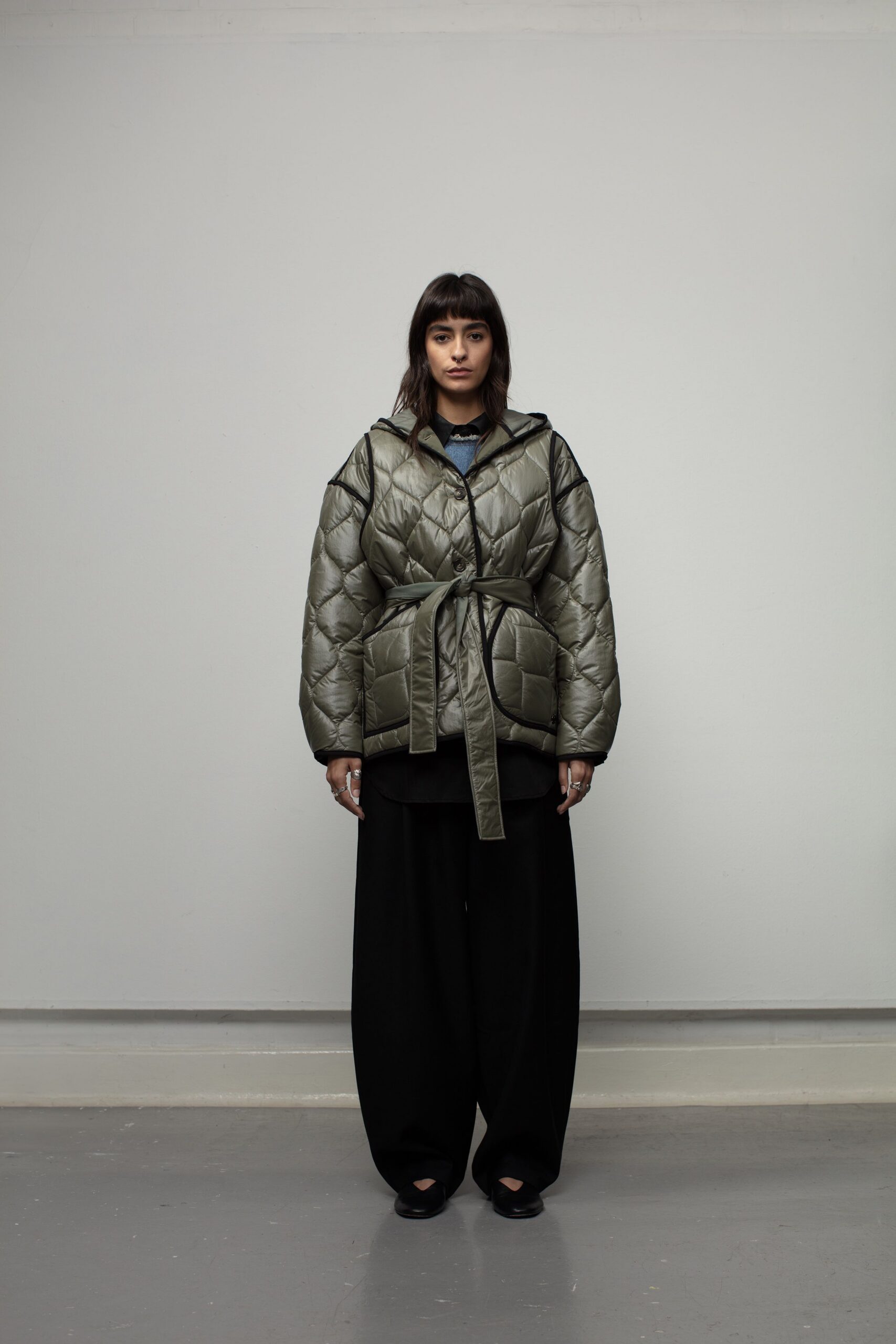 green jersey long-sleeve collared relaxed quilted belted jacket