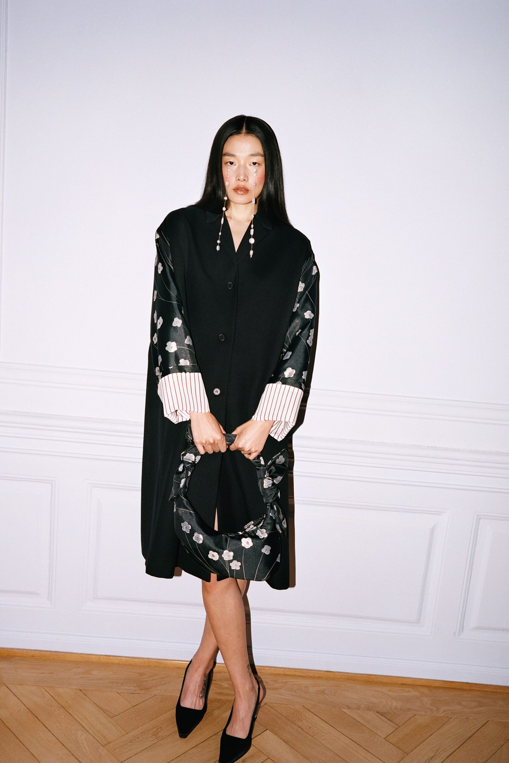 black wool long-sleeve collared relaxed buttoned midi cape
