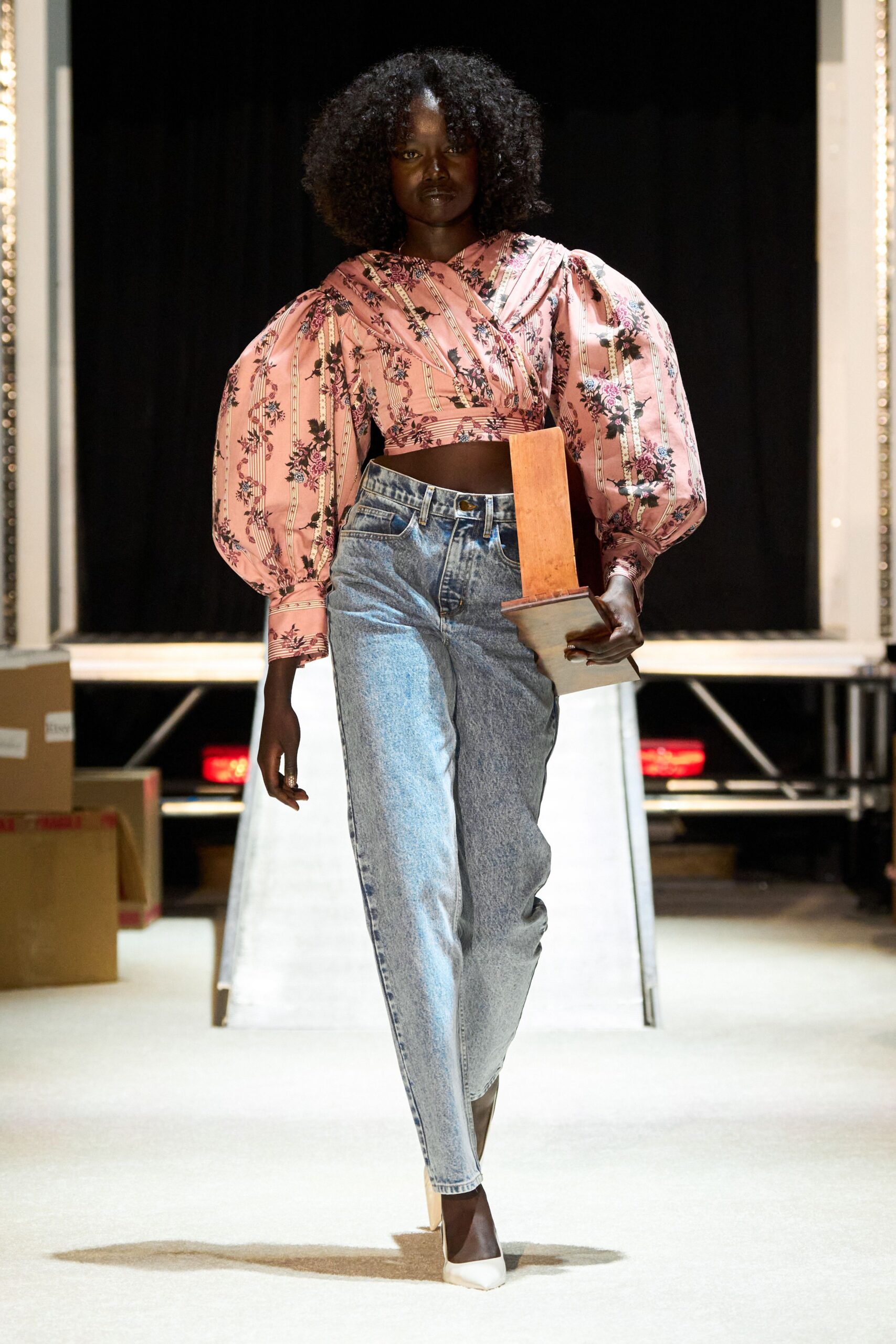 pink embroidered top with jeans