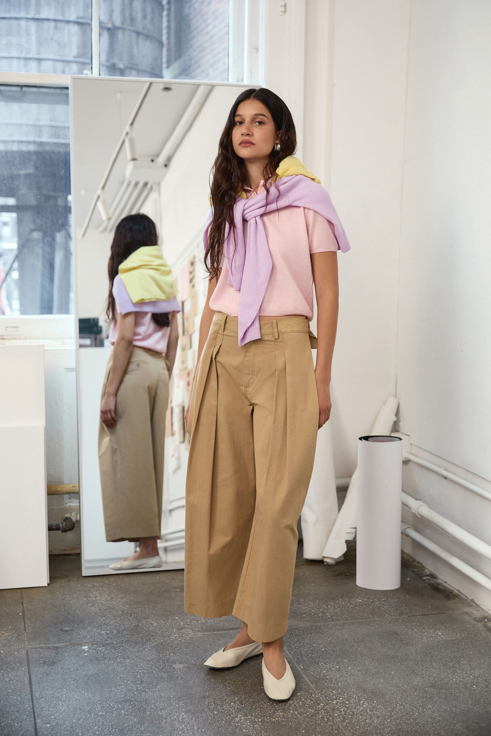 pink top beige wide-leg pants