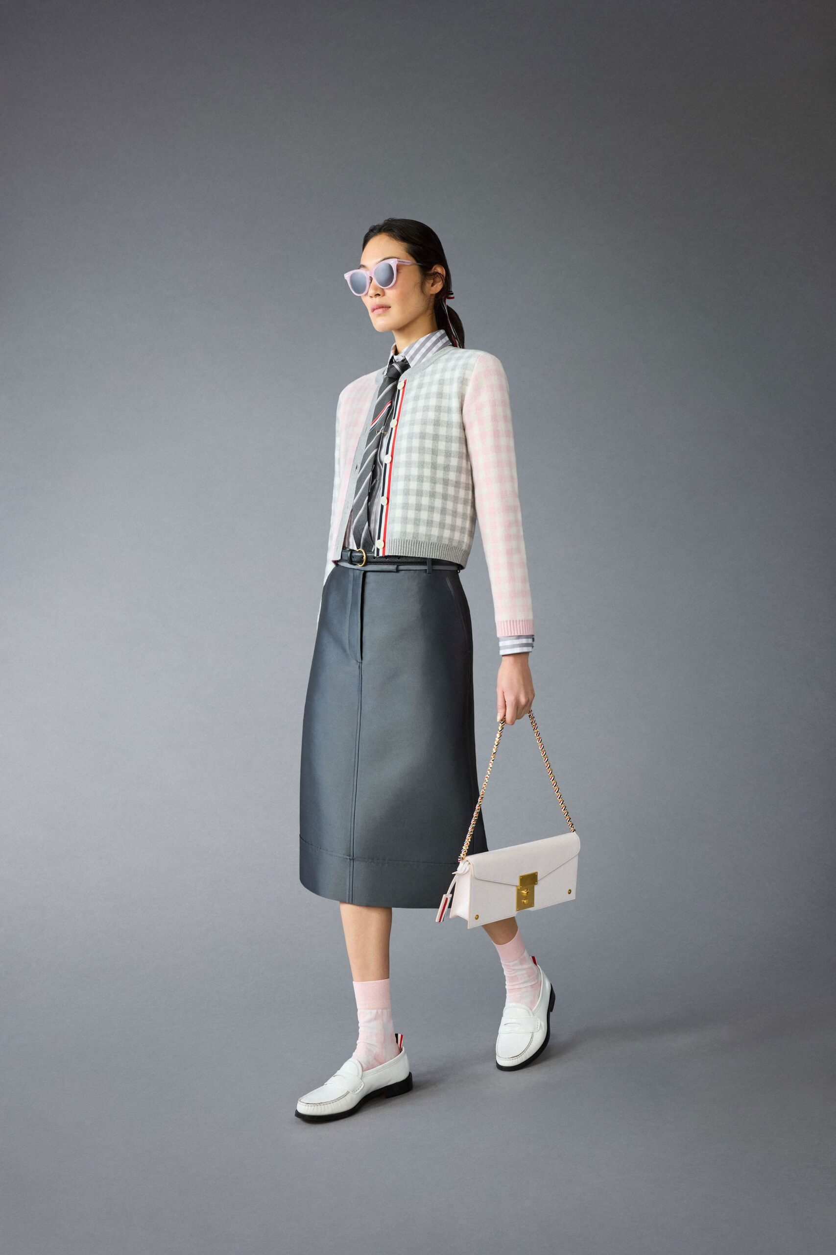fitted white blouse and black skirt