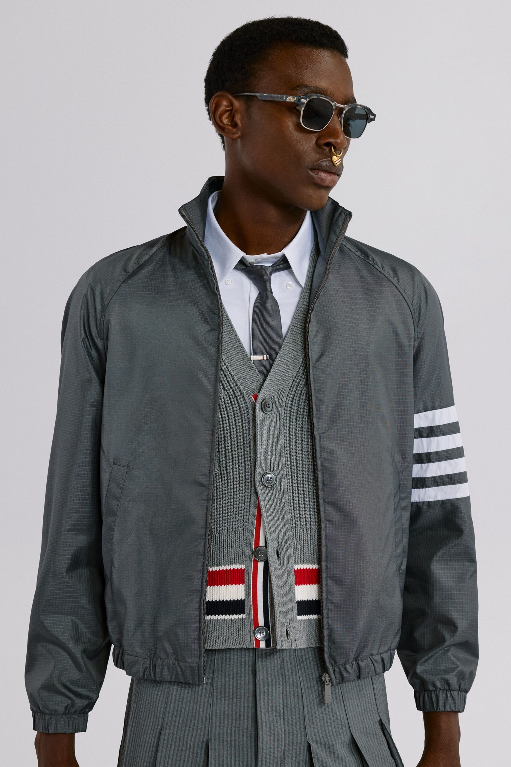 gray wool sleeveless collared fitted buttoned vest