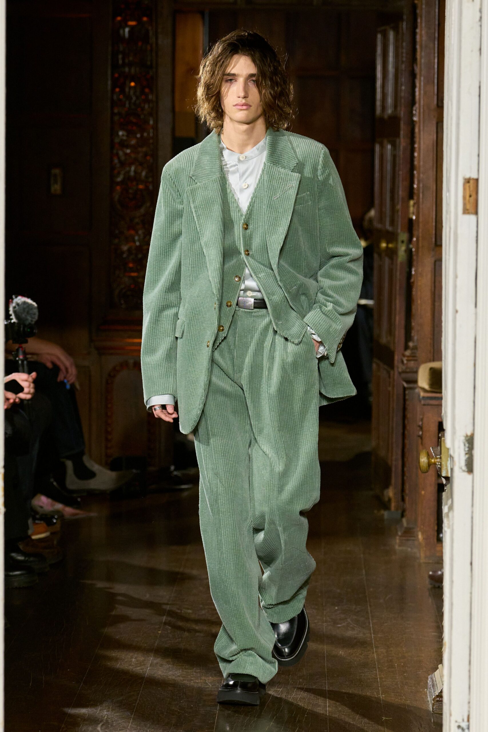 green corduroy suit with white shirt