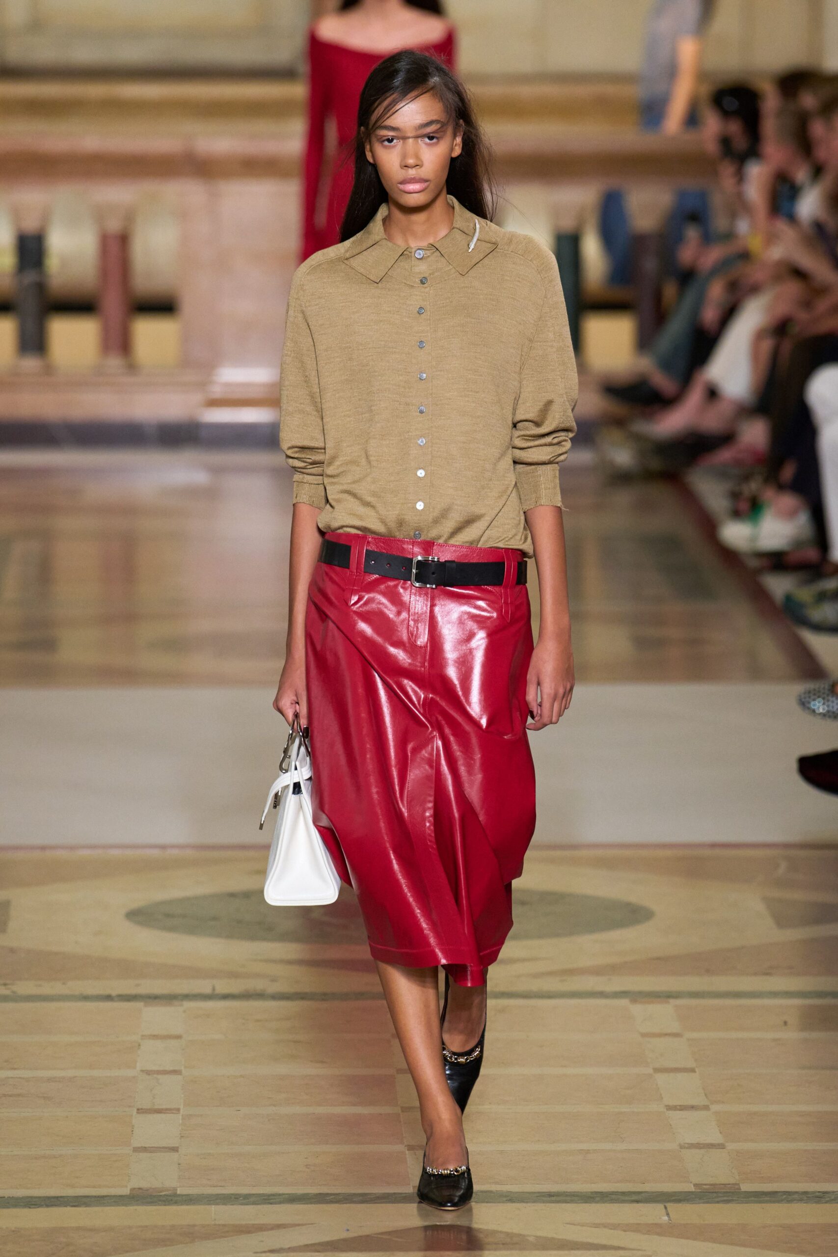 beige shirt red leather skirt